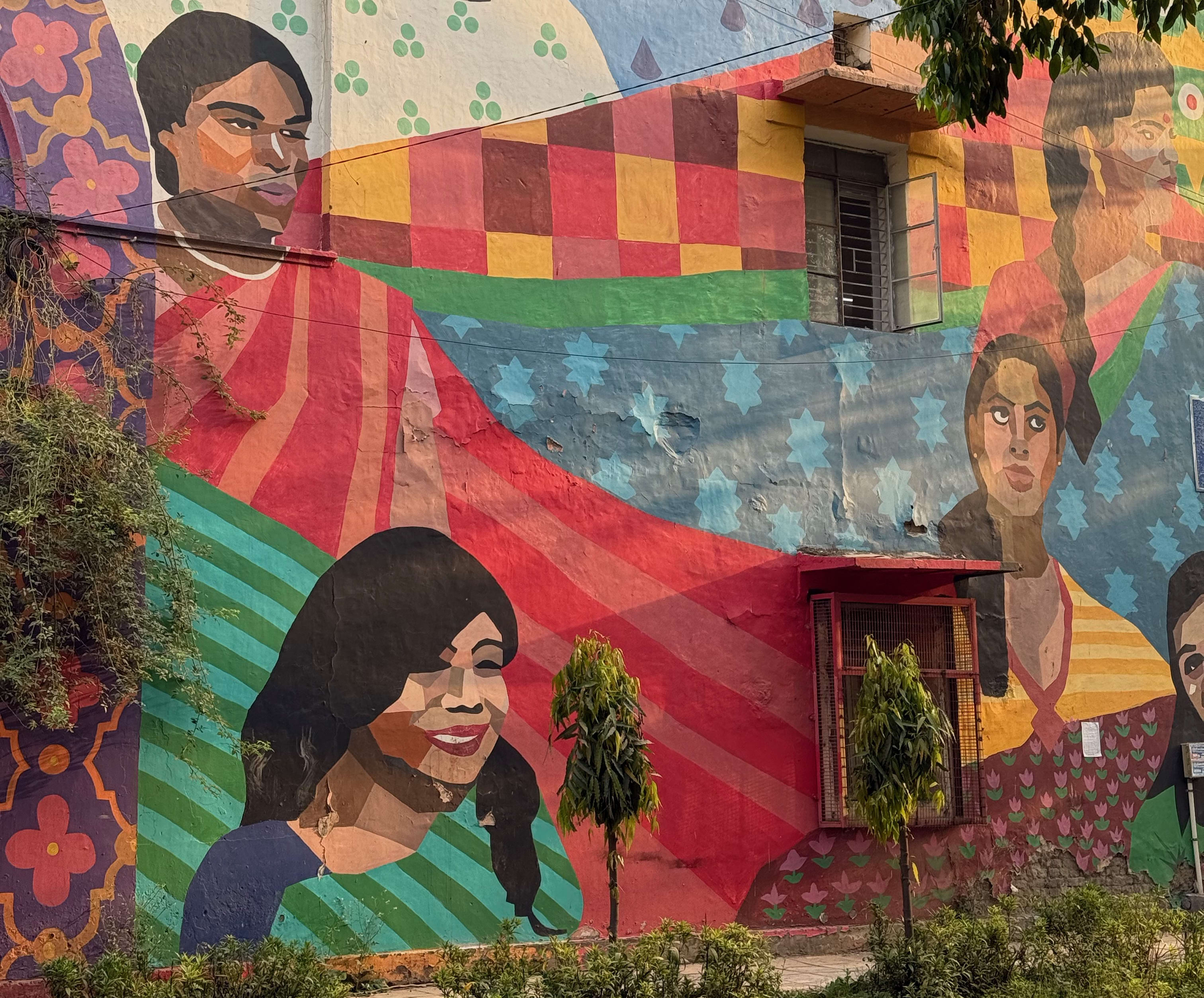 a colorful street mural on a busy road