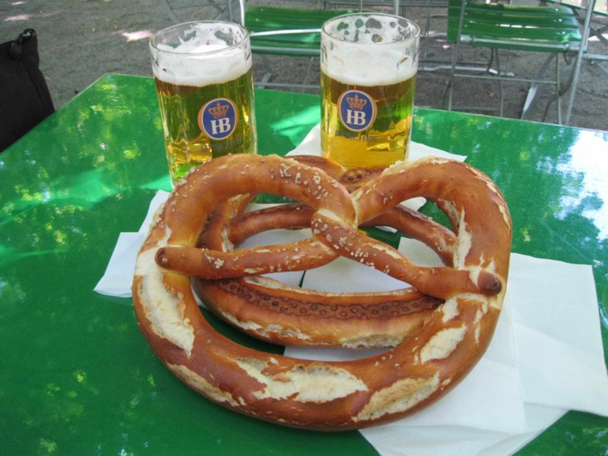 Bavarian pretzel and beer at the Oktoberfest festival.