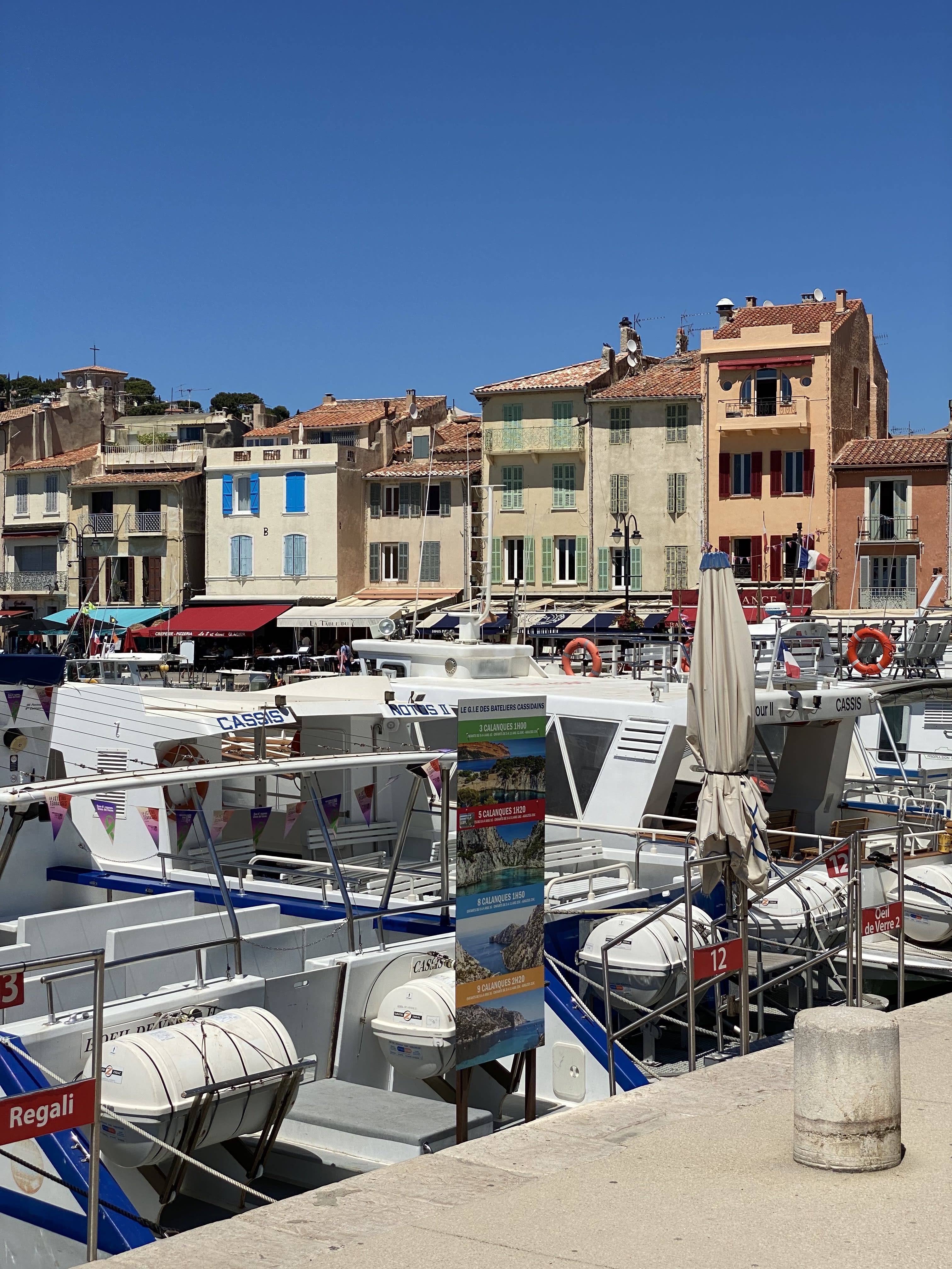 View of boats docked at the pier