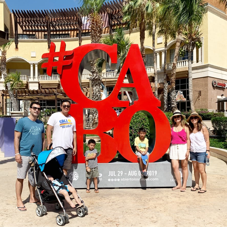 Picture of Tiffany with famili with Cabo sign