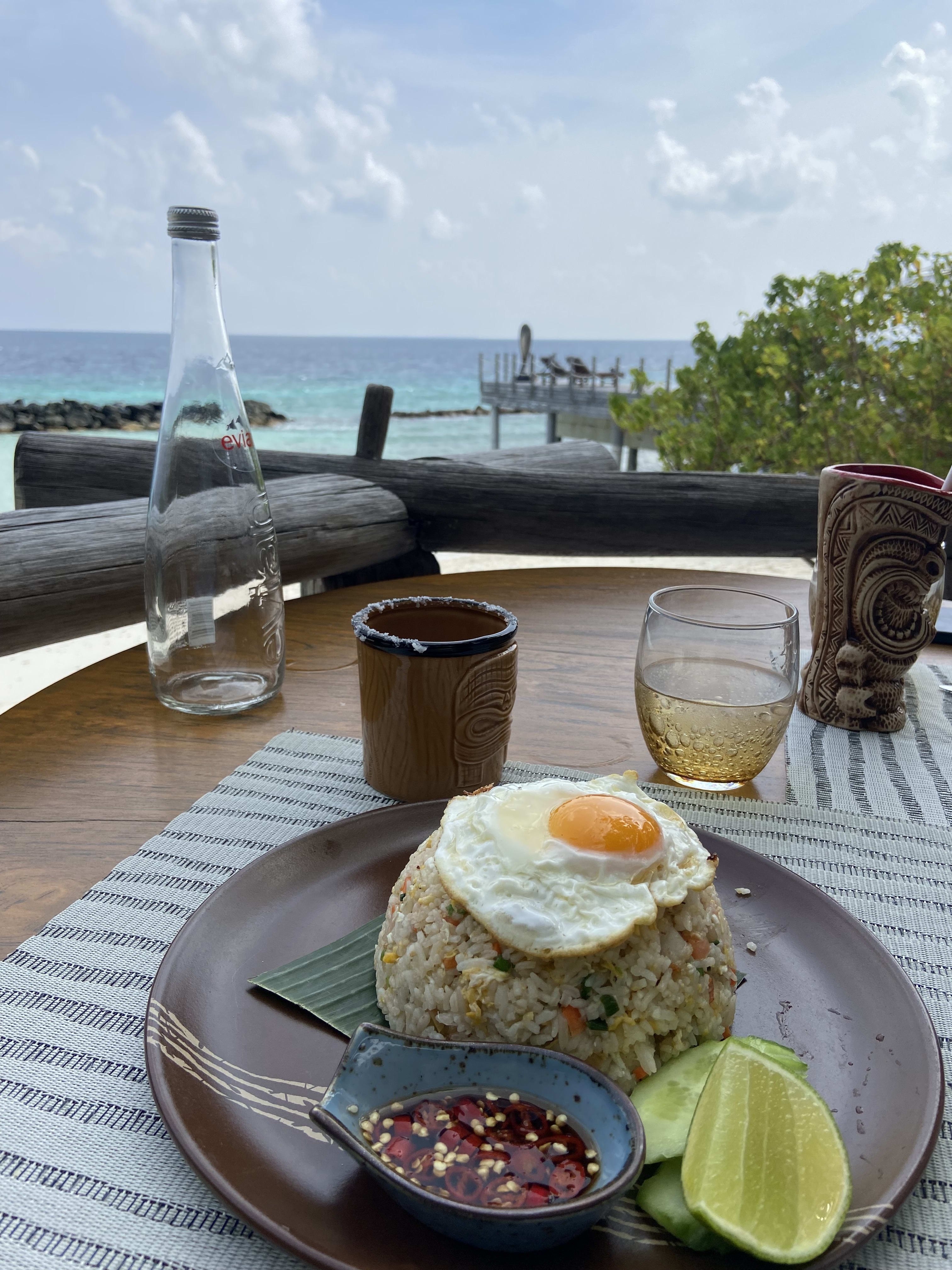 Having fried rice with beautiful view