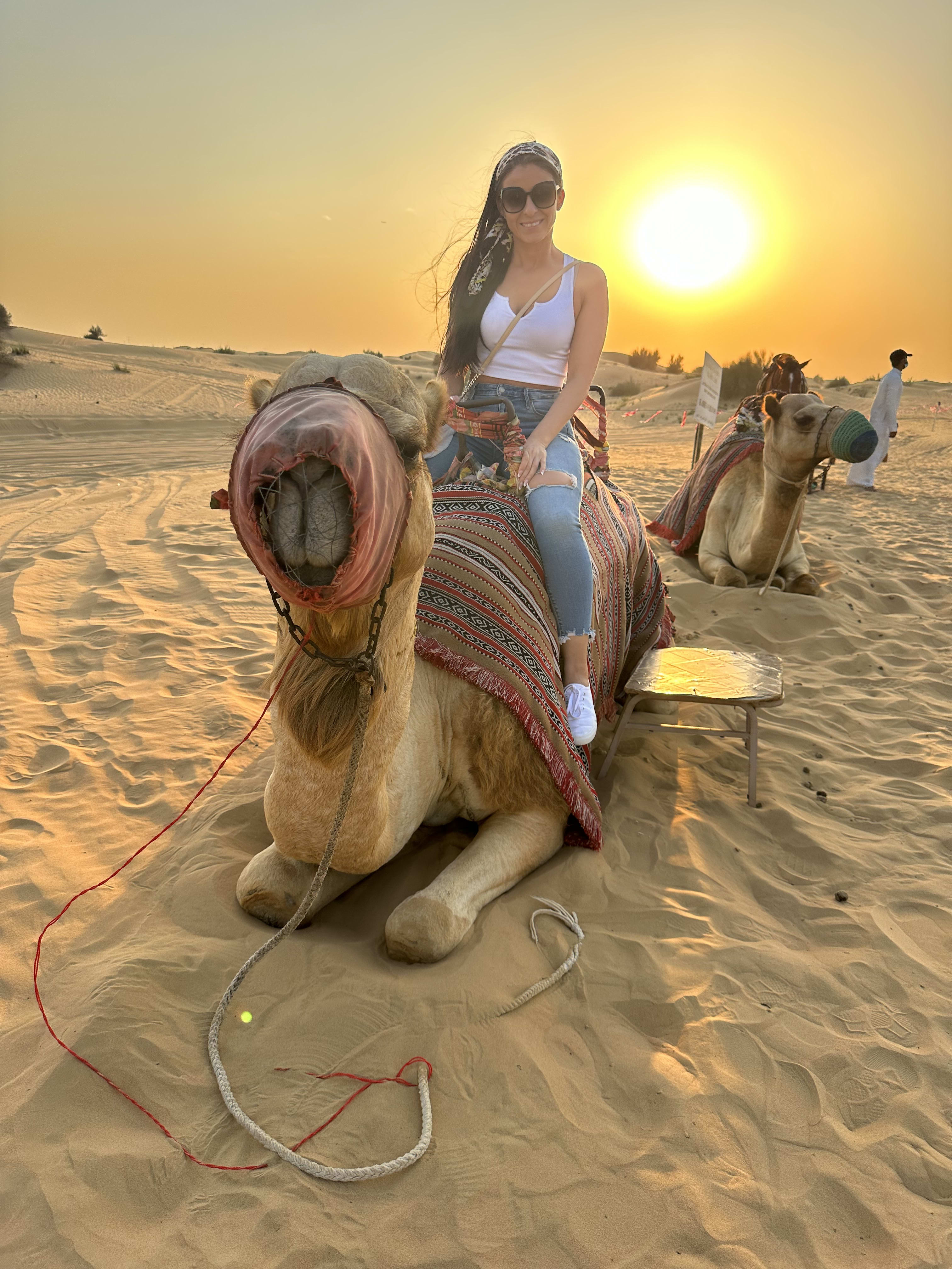 Olsa riding a camel