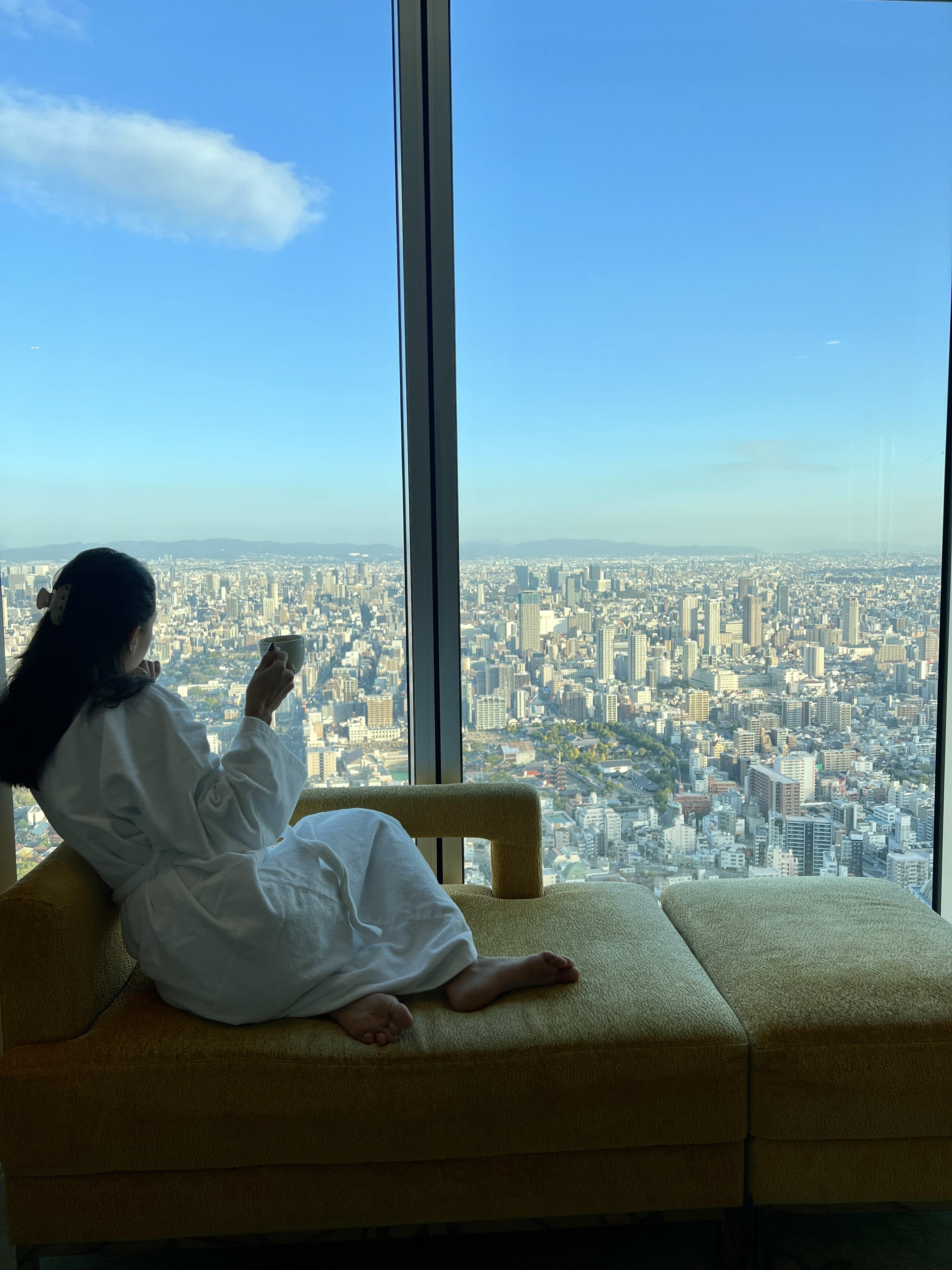 Having a cup of coffee and looking at the city views