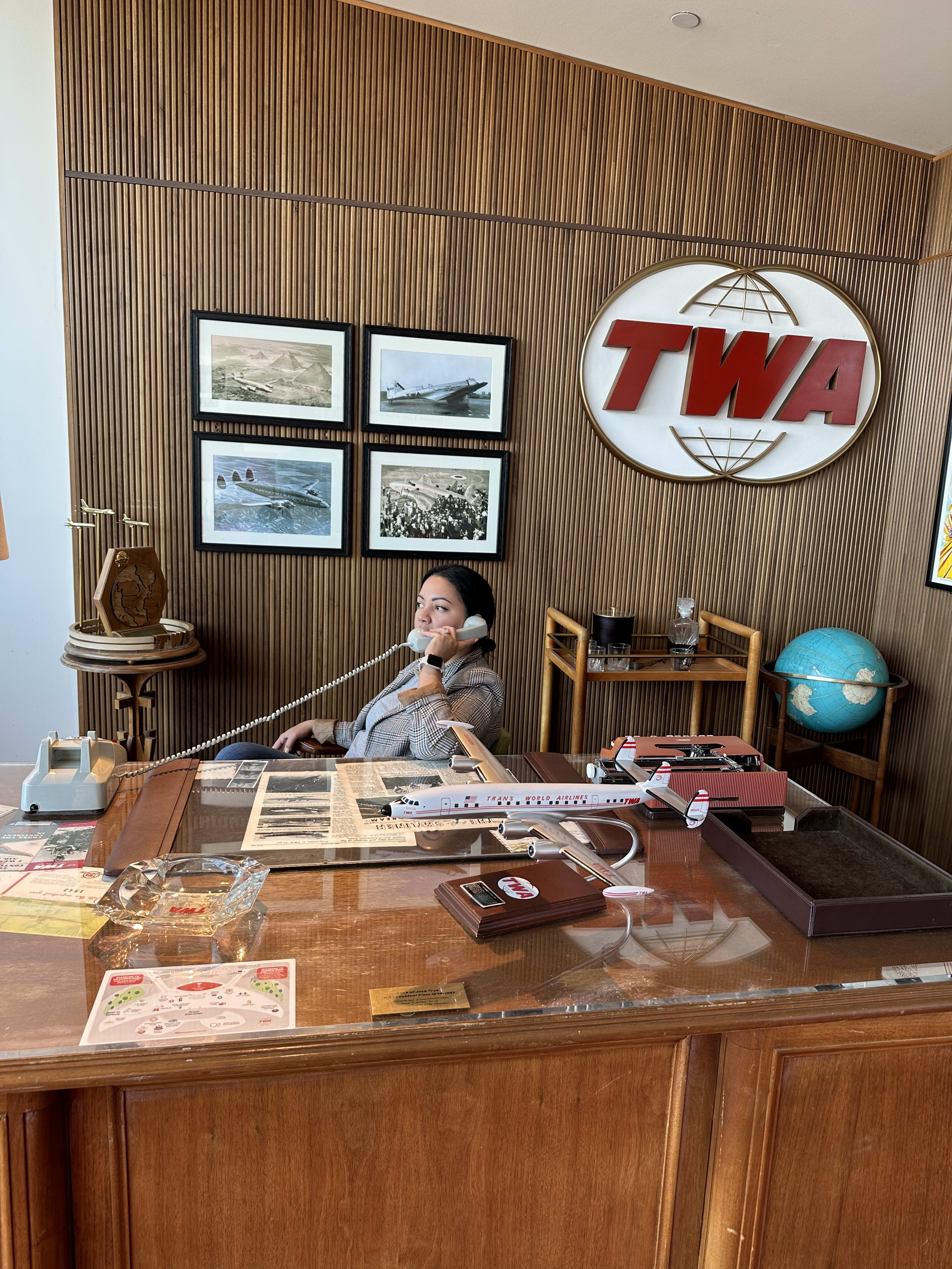 Picture of Geona in office on a call