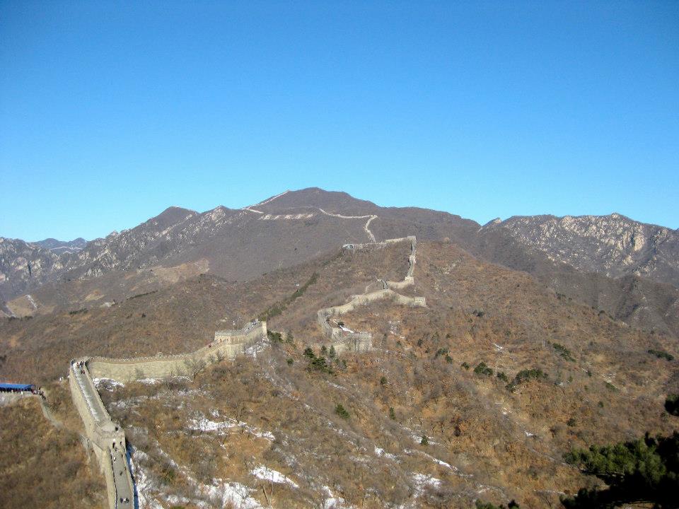 Beautiful view of the Great Wall of China stretching into the mountains on a clear day