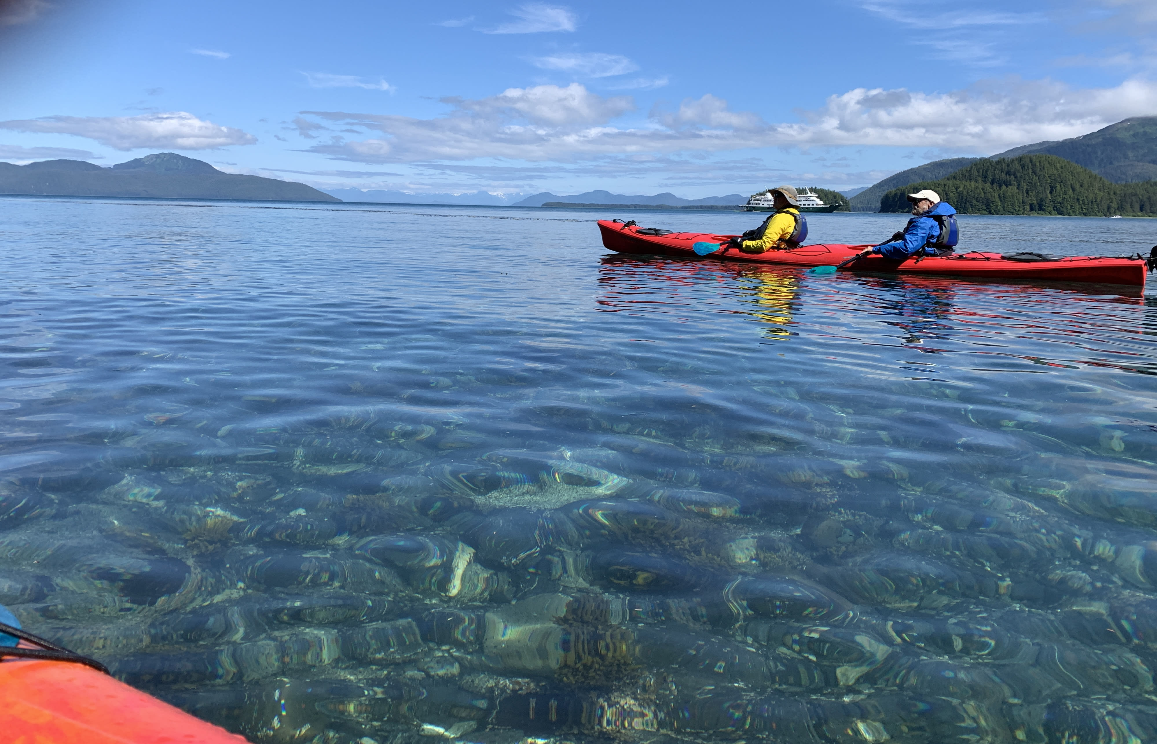 Image 1: Kayaking just off the boat
