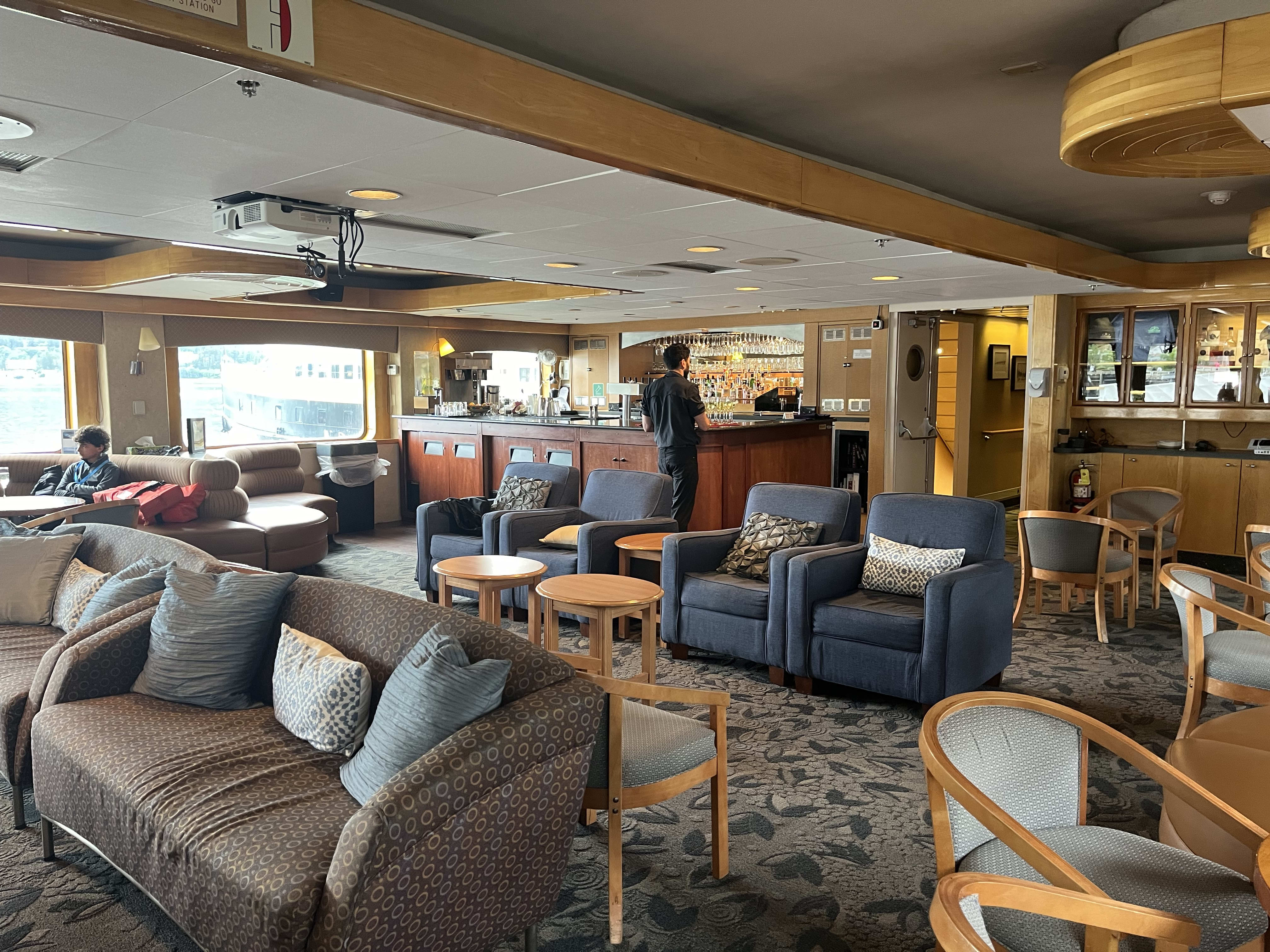 Image 1: Bar and lounge area