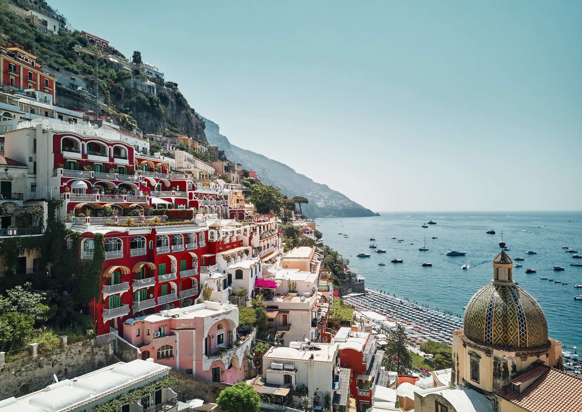 Landscape view during daytime of cliffside village on the ocean