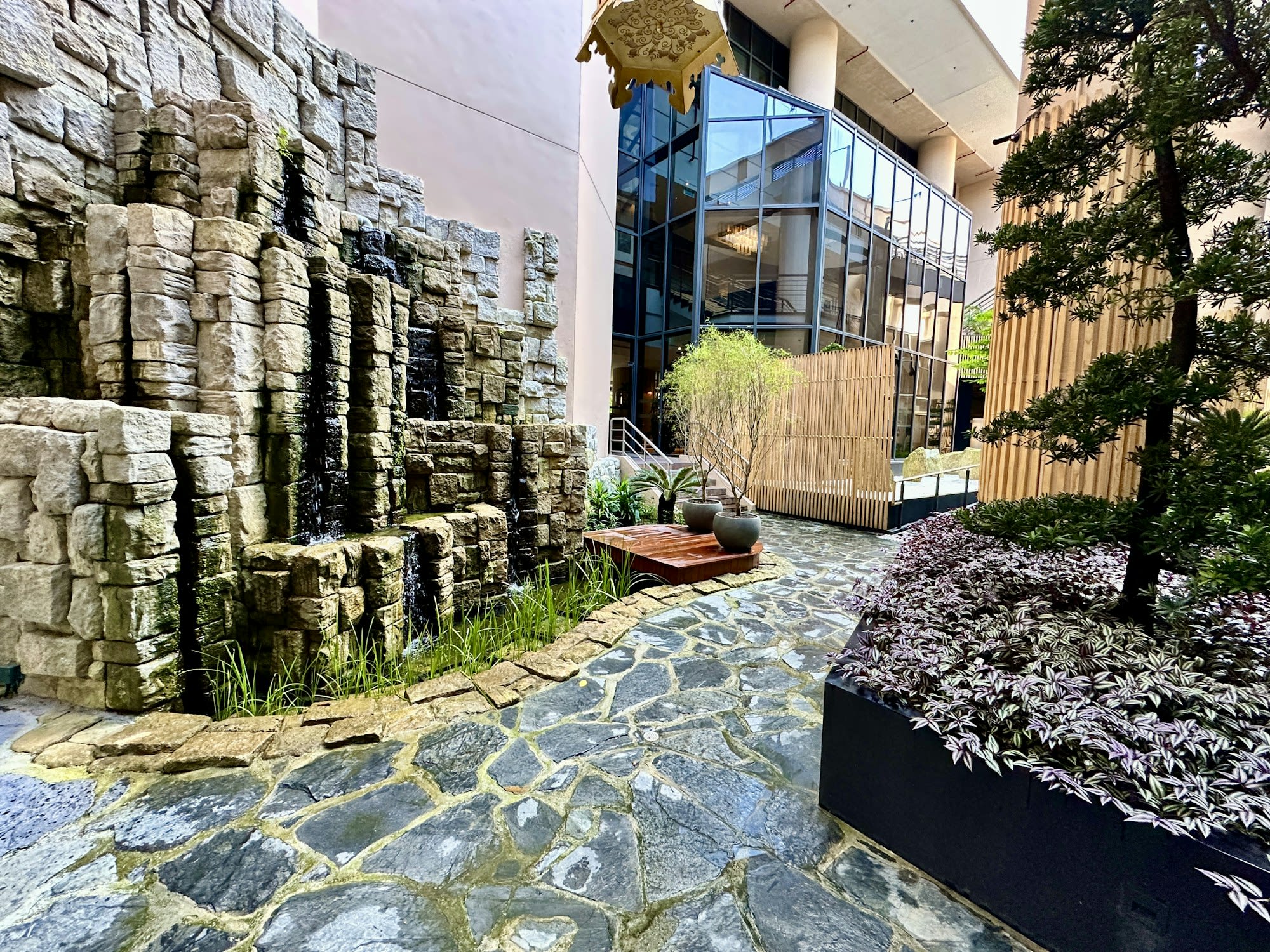 a secret urban garden terrace with stone flooring