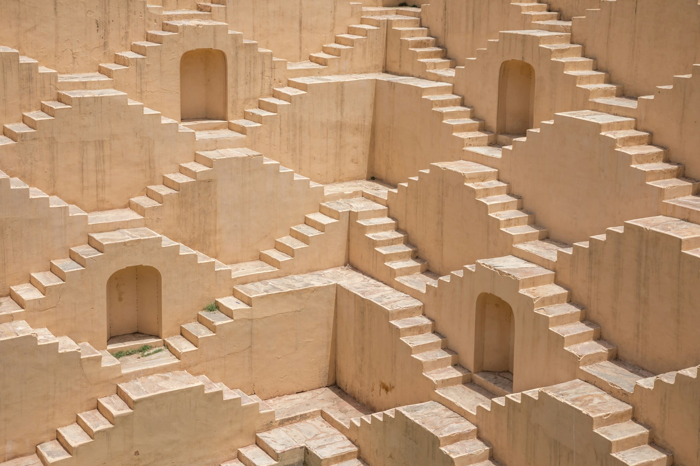Large complex of beige criss crossing stone stairs