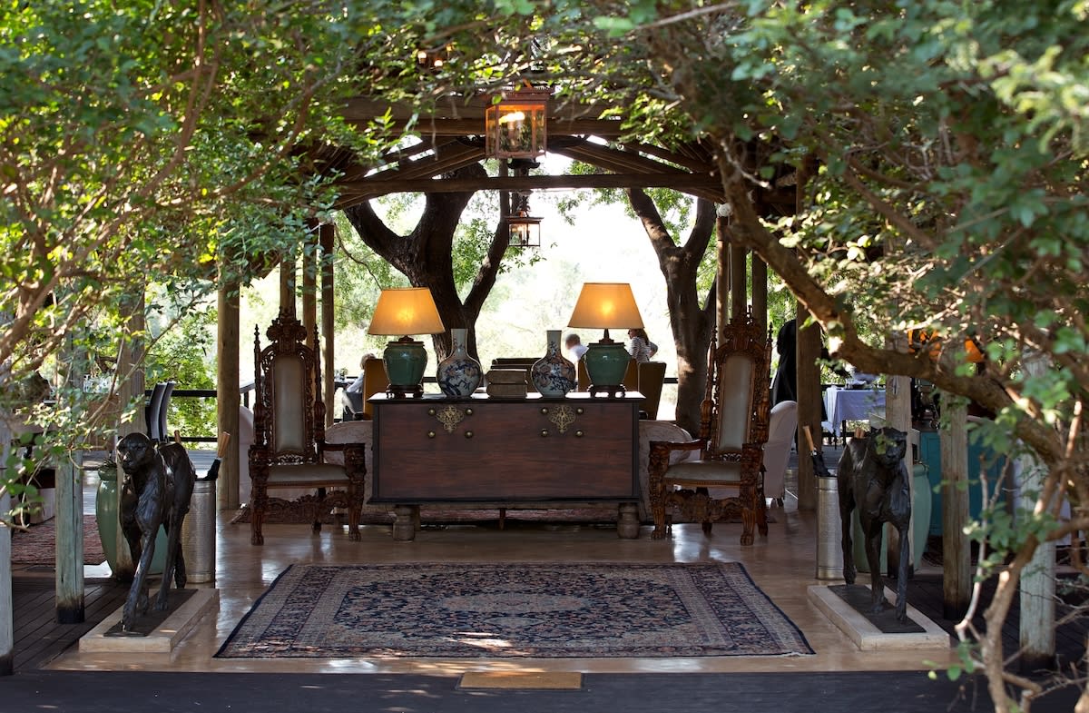 a fancy open-air foyer of an African hotel