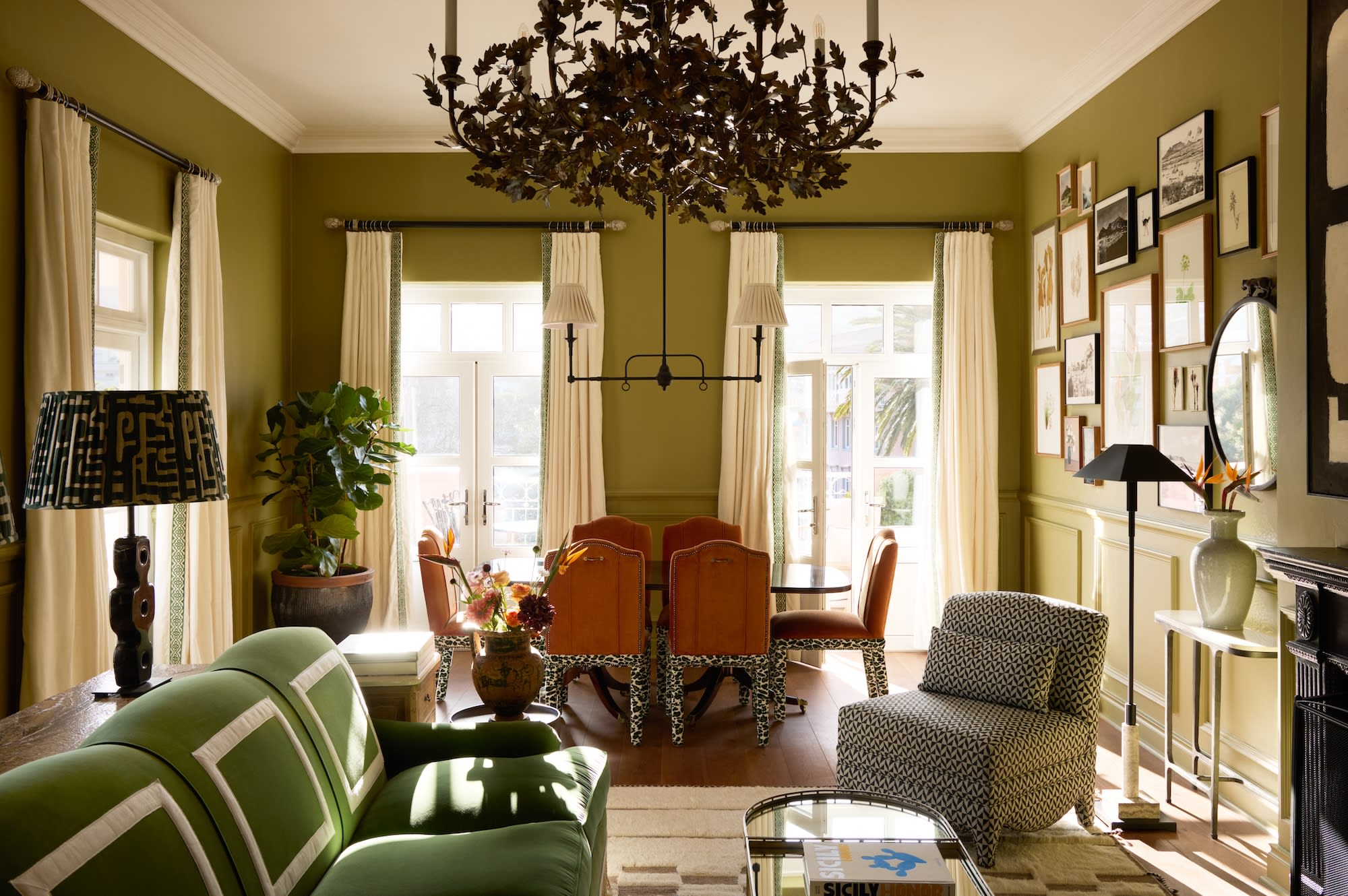 a luxurious, colorful living room at Mount Nelson, A Belmond Hotel, Cape Town