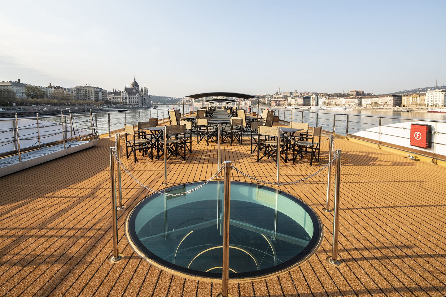 deck on a ship with river view