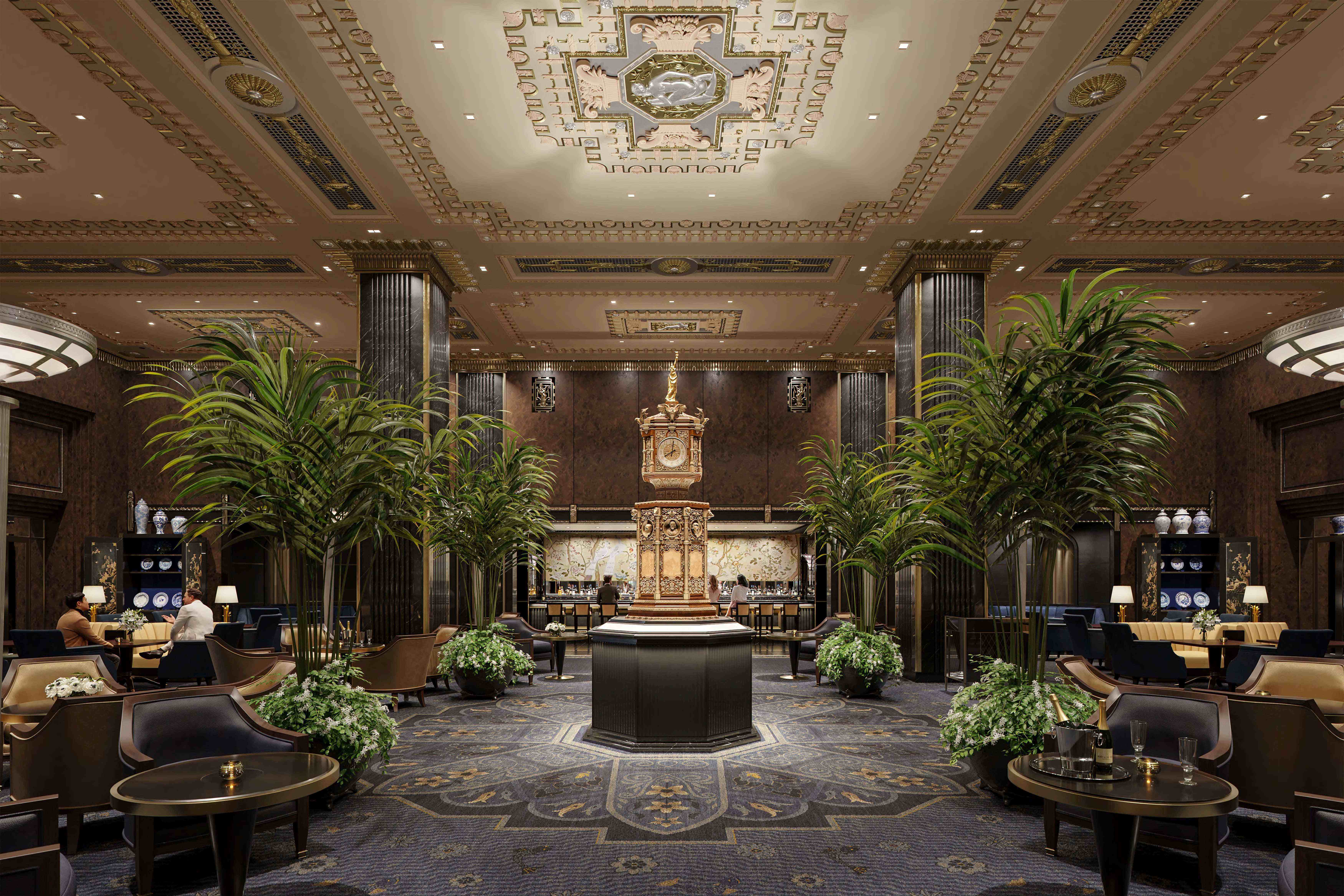 Luxurious hotel lobby with ornate ceiling, tall columns, lush plants, and a grand antique clock centerpiece.