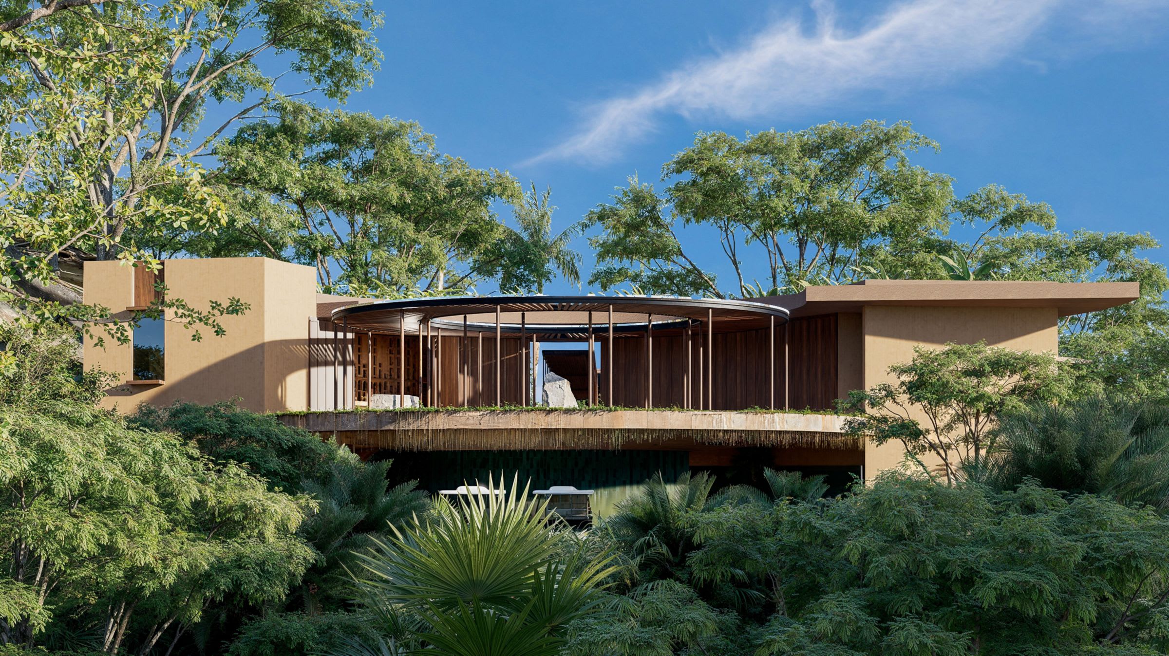 Modern eco-style villa surrounded by dense greenery with a circular open-air pavilion and minimalist architecture blending into the forest setting.