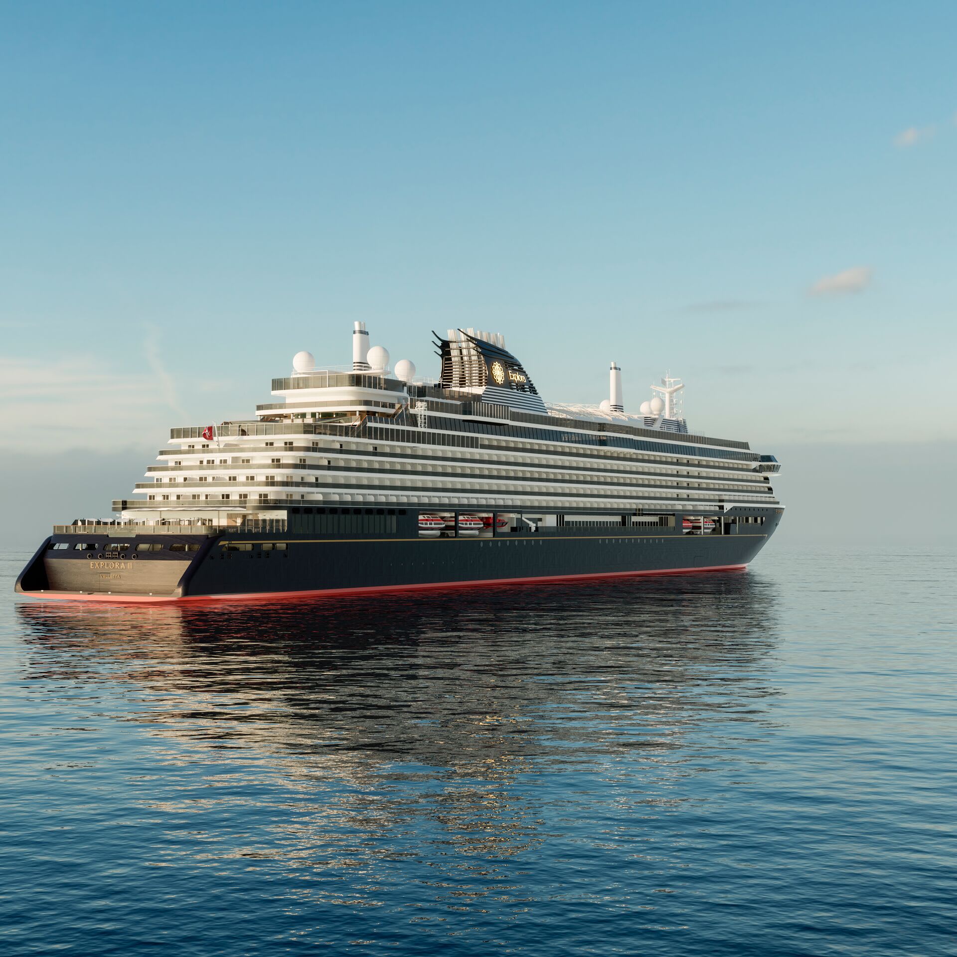 A sleek, modern luxury cruise ship sailing on calm open water, shown in profile with tiered decks, glass-fronted balconies, and a dark navy hull under a clear blue sky.