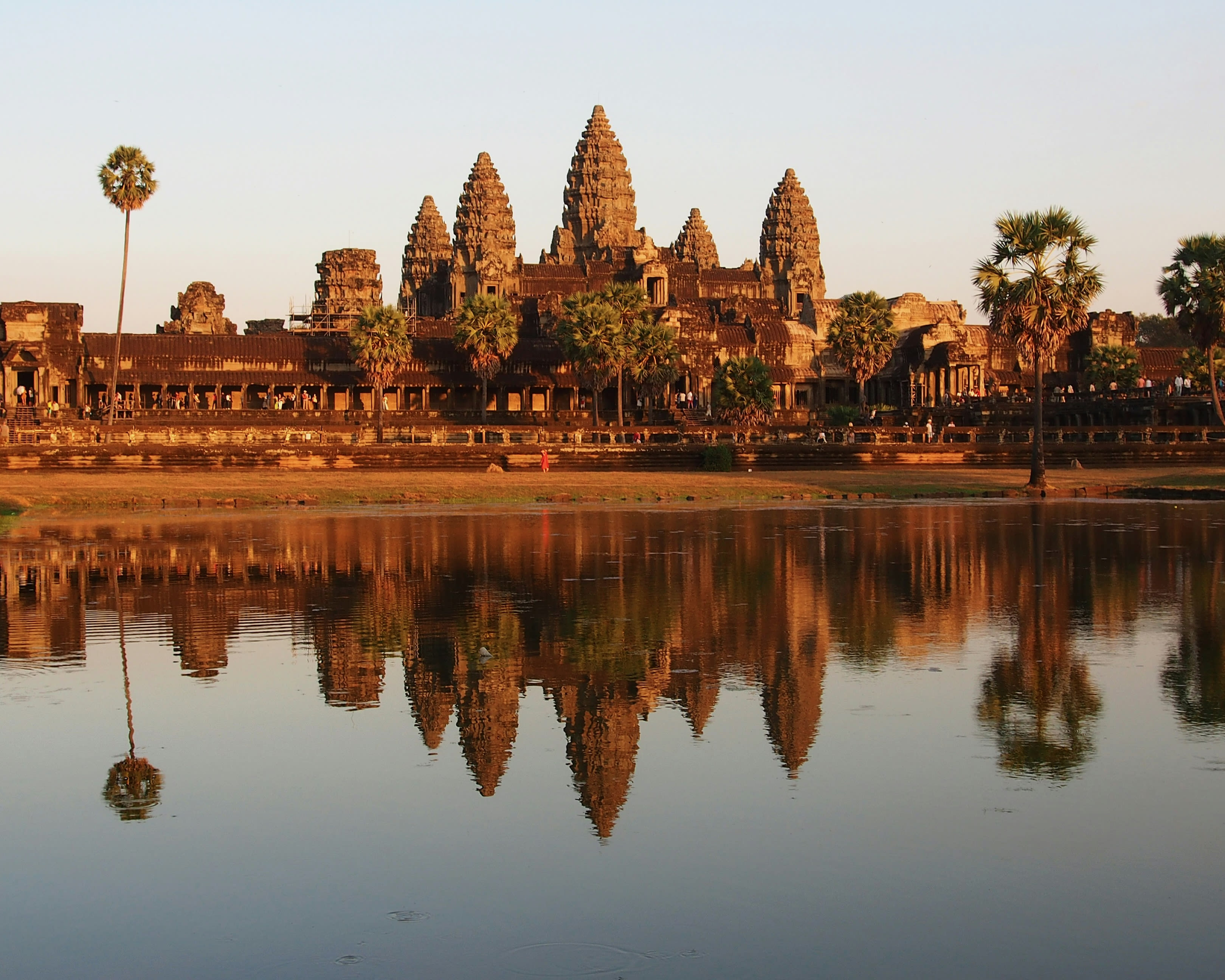 temple of ankgor wat at sunrise reflected in the water