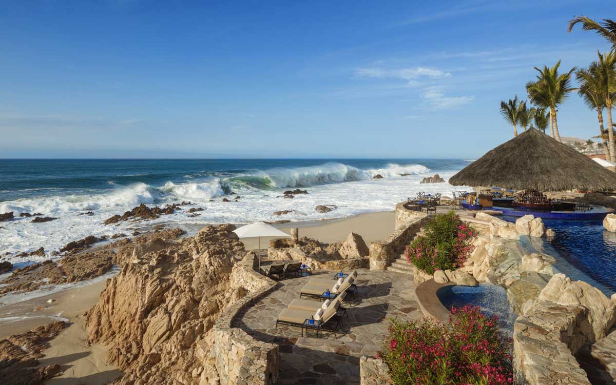 a cliffside terrace overlooking the ocean