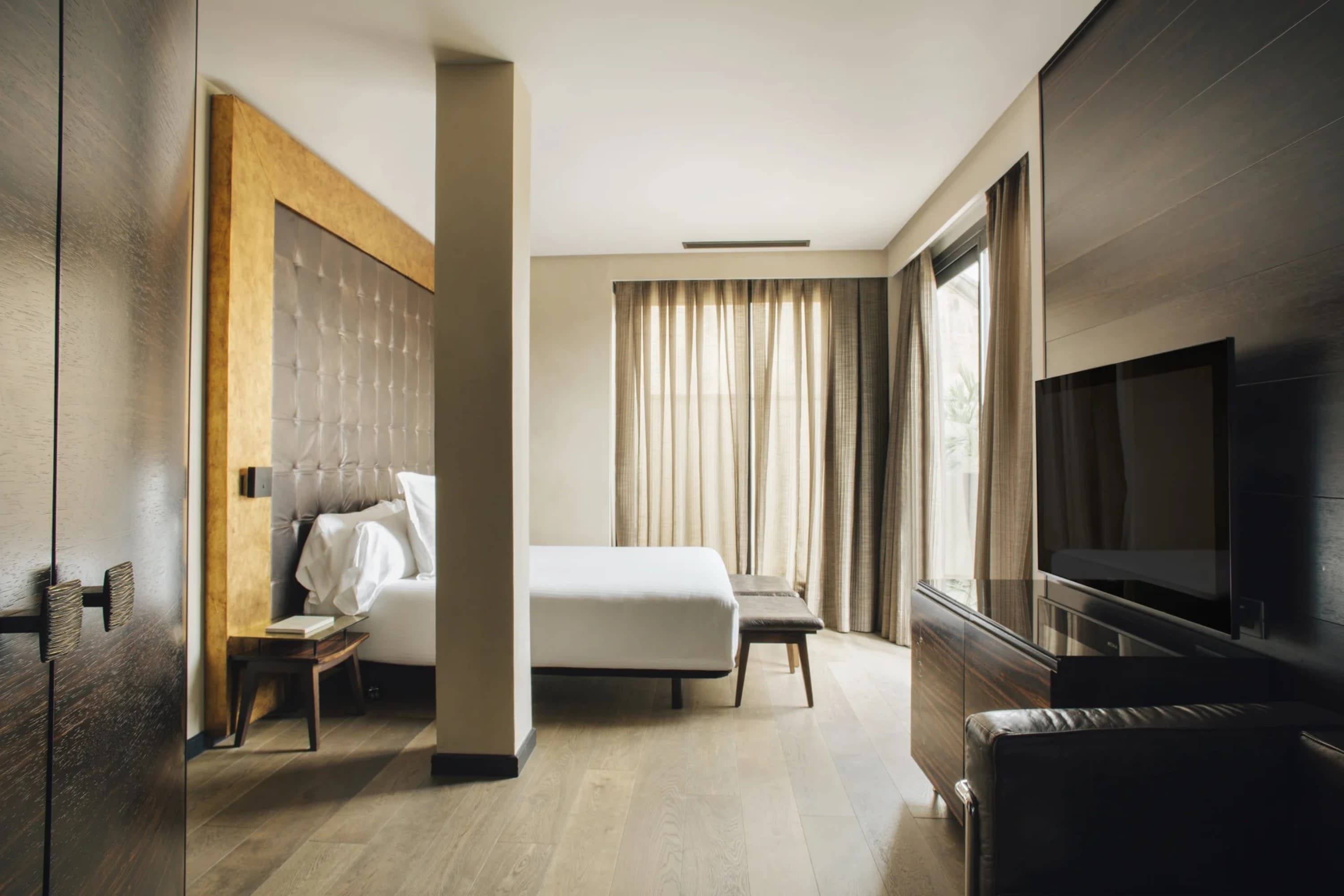 Posh room with leather furniture, hardwood accents and a mature vibe