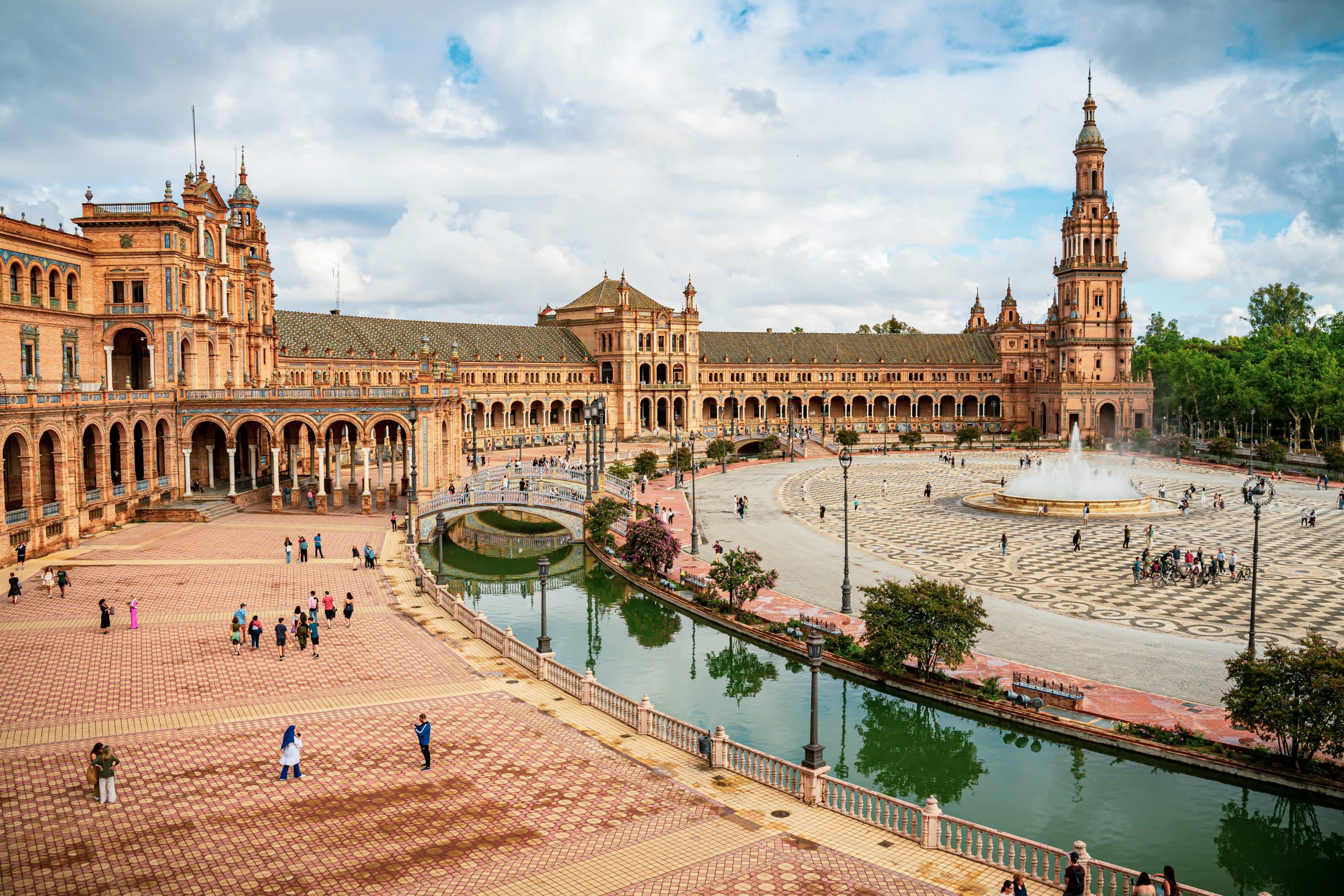 A historical structure built in a massive semi-circle with canals and wide boulevards