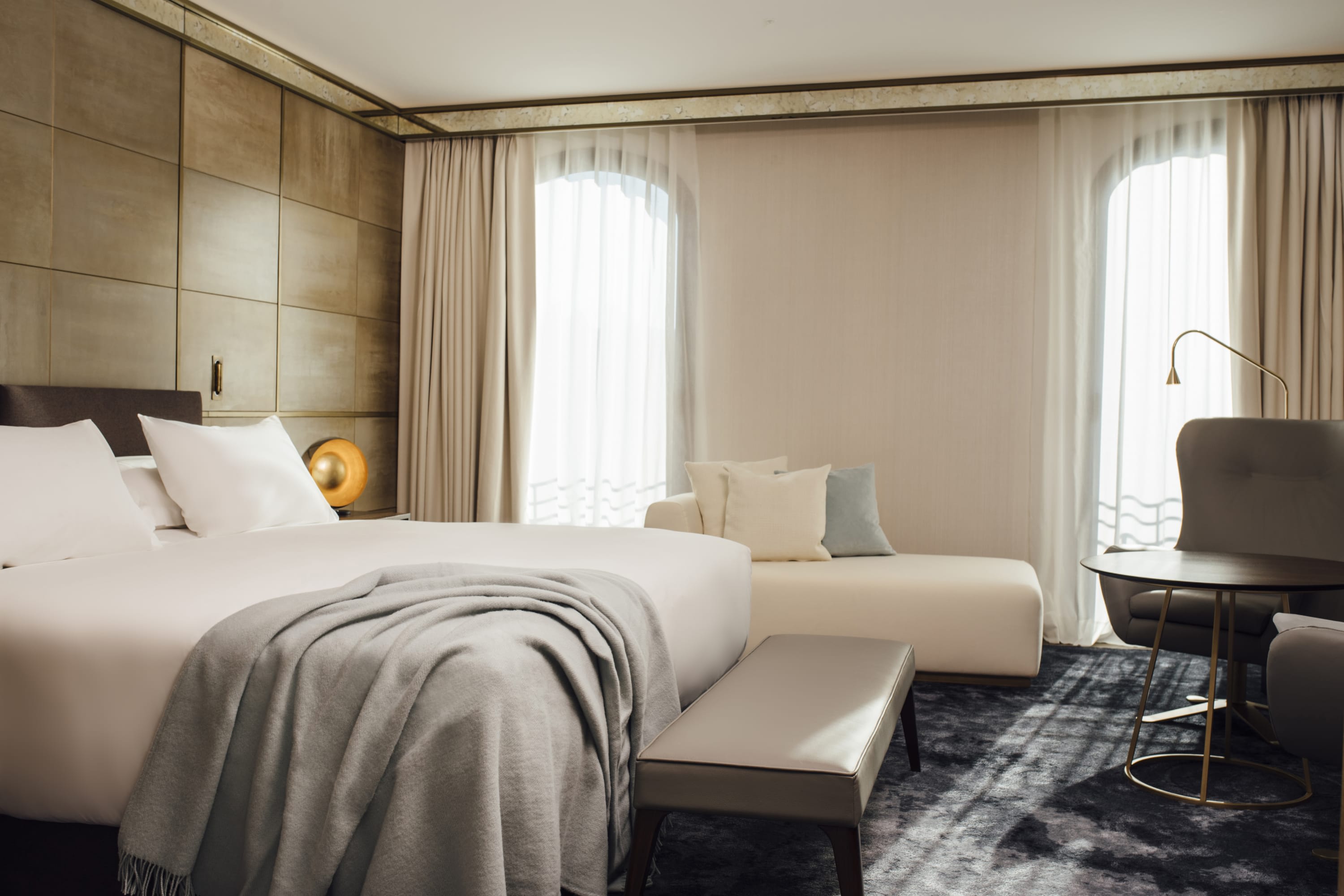 Upscale hotel room with a lived-in vibe, plenty of space and a contemporary aesthetic