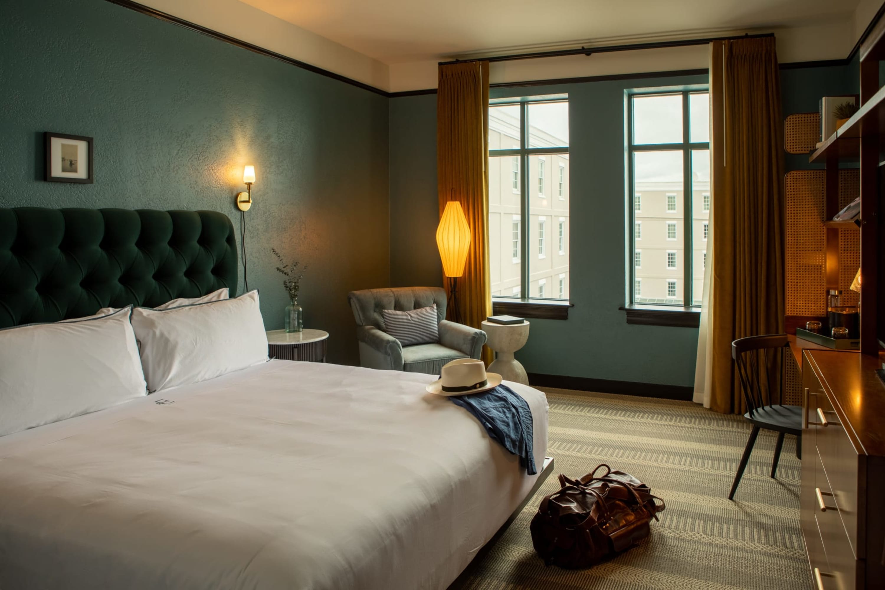 Moody, contemporary take on a Southern art deco aesthetic in a hotel room