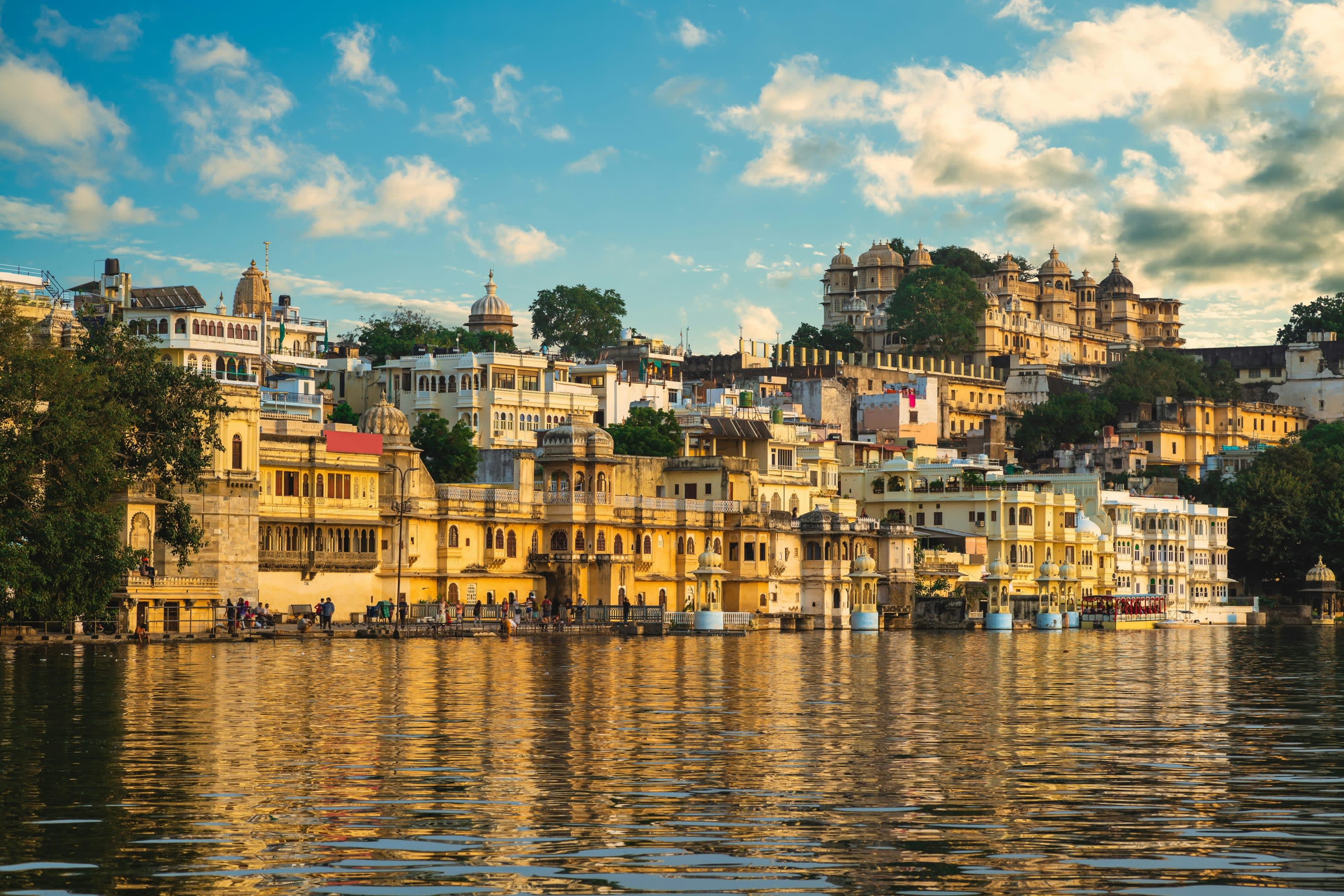 Calm waters lead to grand, historic architecture along the shoreline