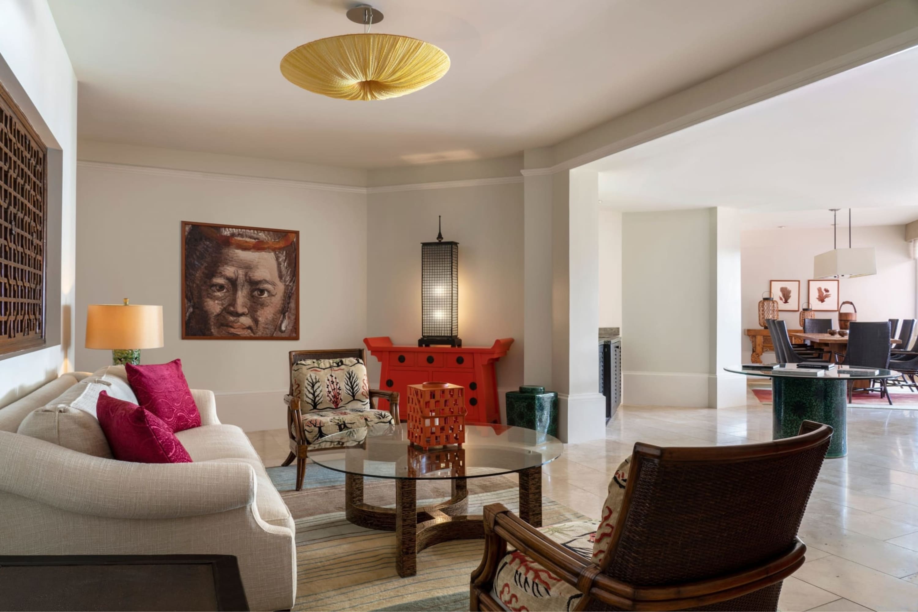 Elegant suite living room with local art, high-end furniture, and a thoughtful aesthetic