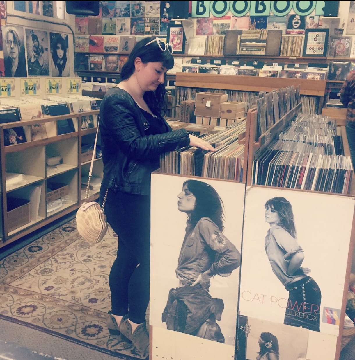 Advisor searching through records in a record store.