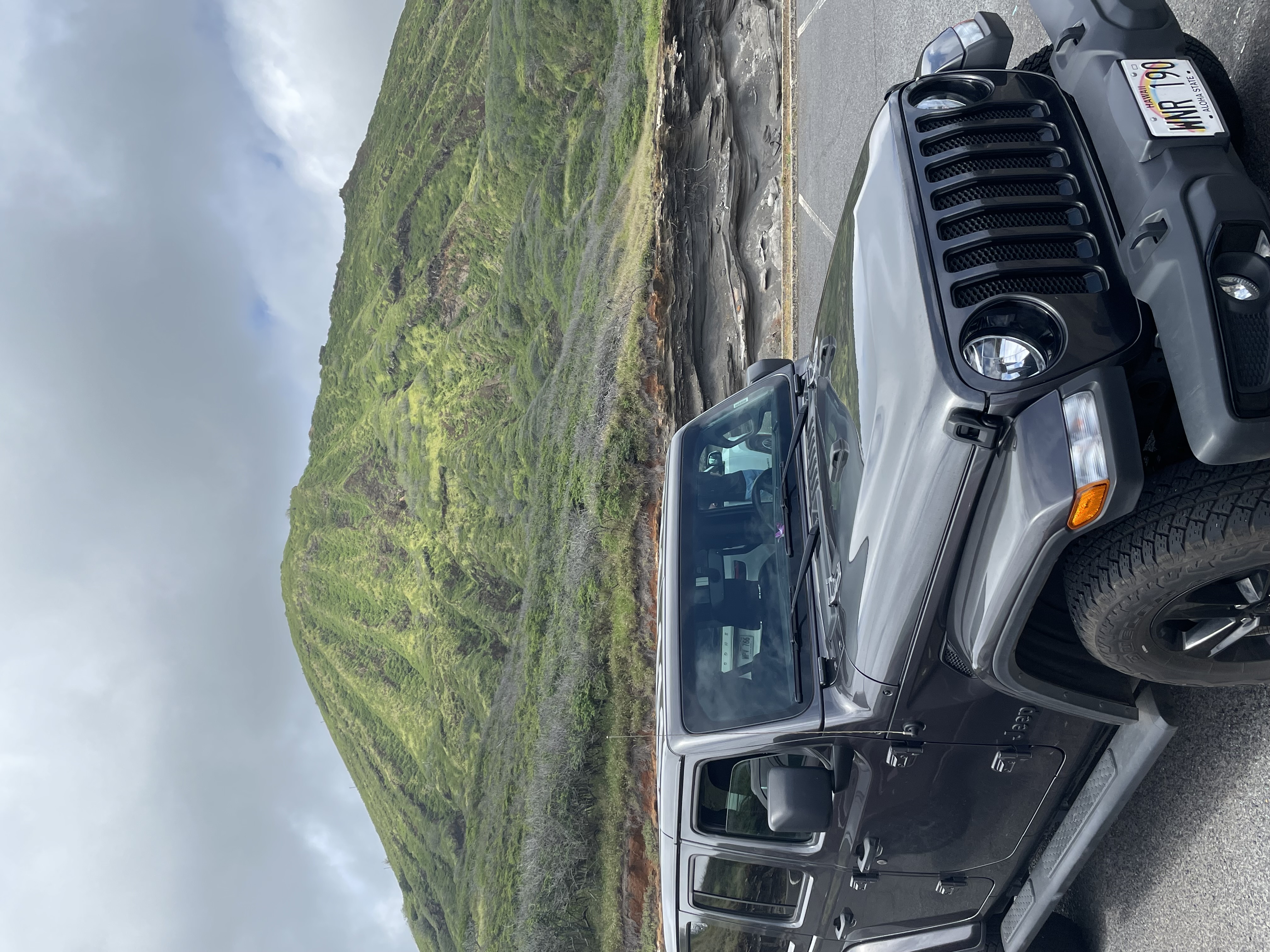 A view of an off roading Jeep during the daytime.