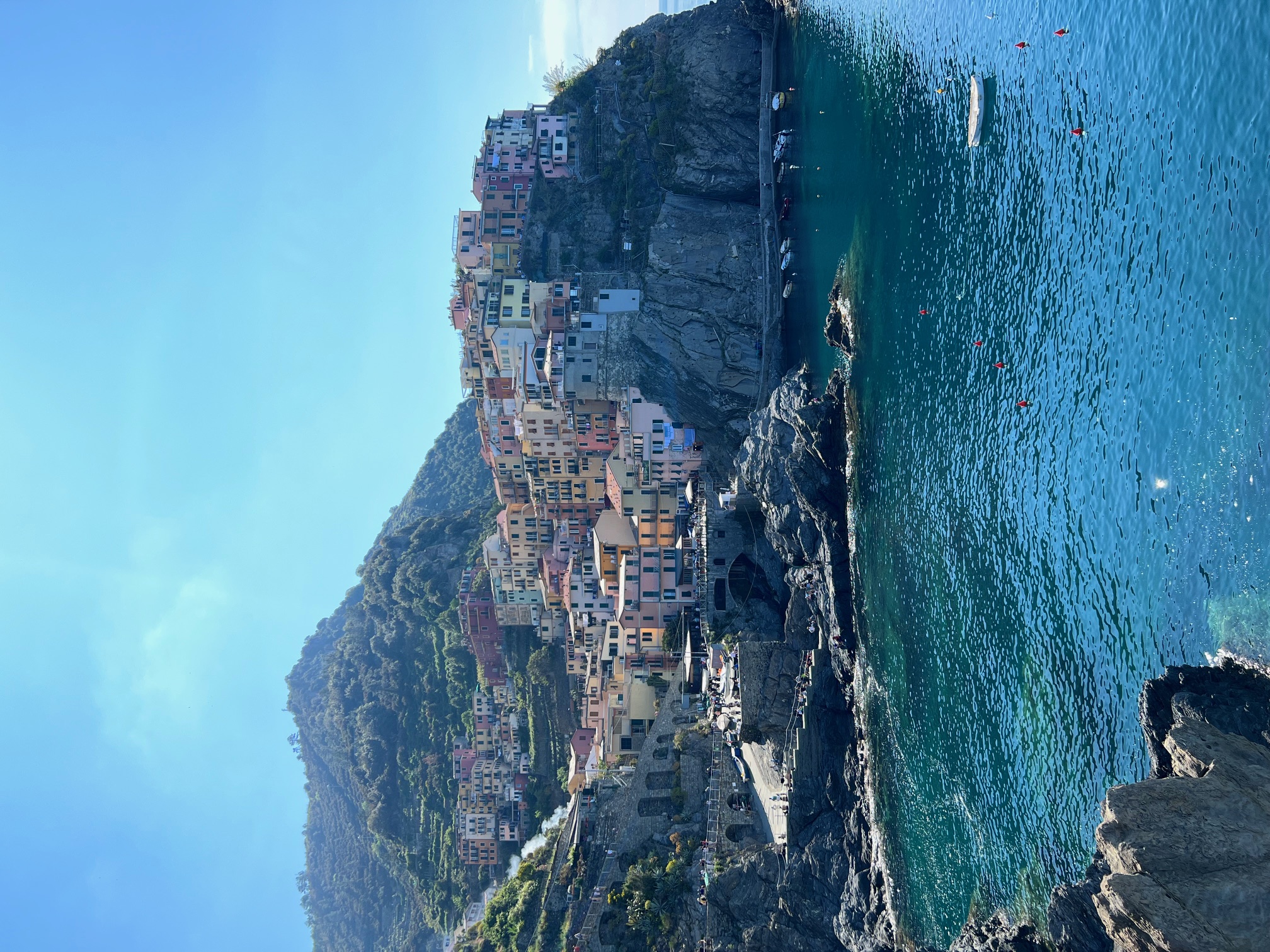View of a small colorful coastal city on a cliffside
