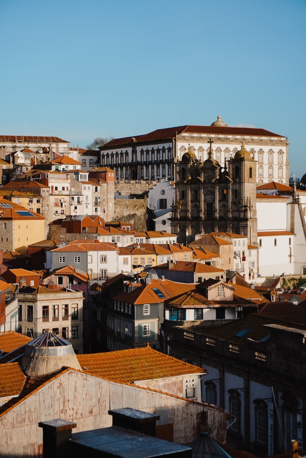 View of a beautiful city on a hill during the afternoon