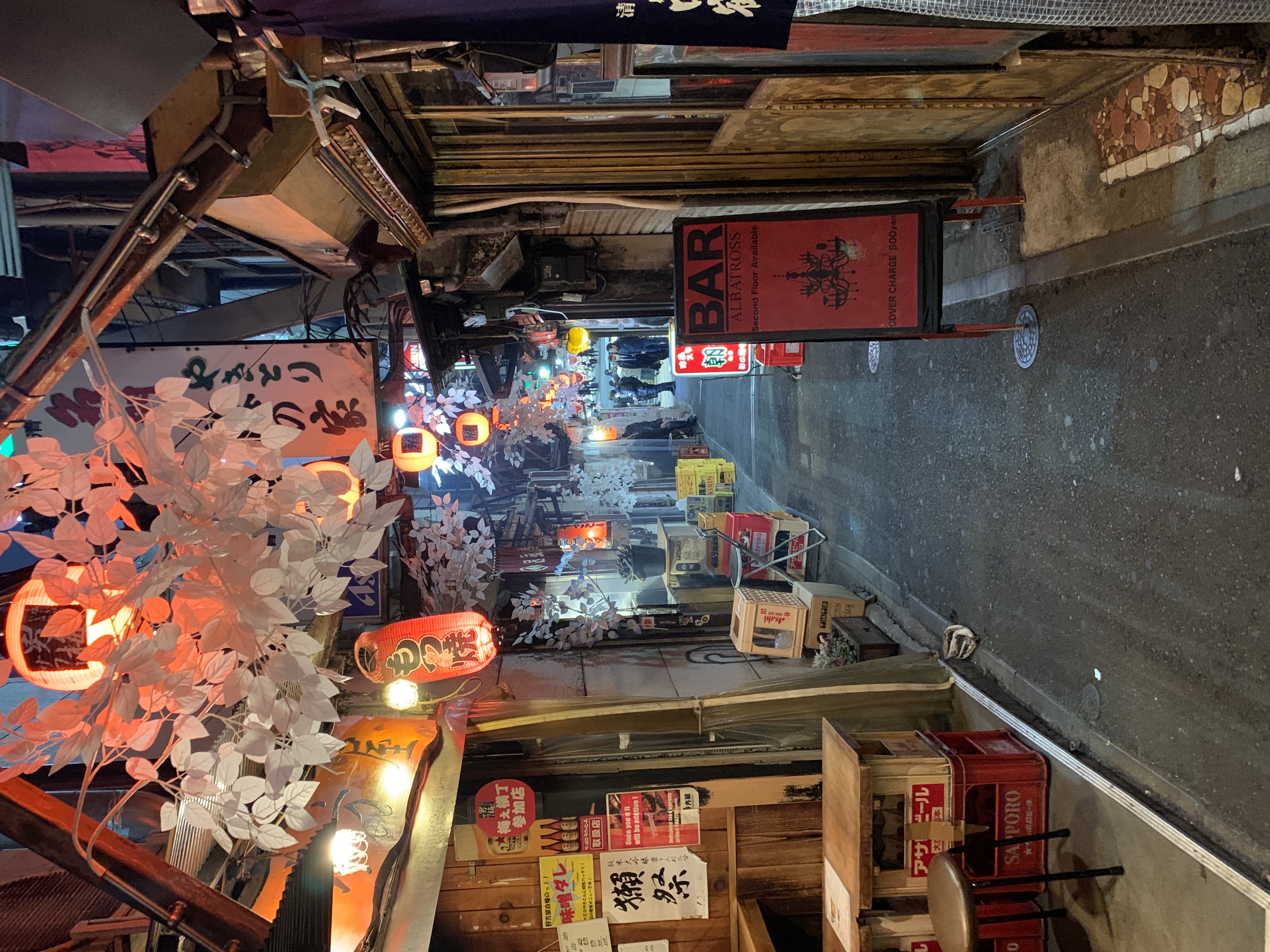 View of a narrow empty street in Japan at night