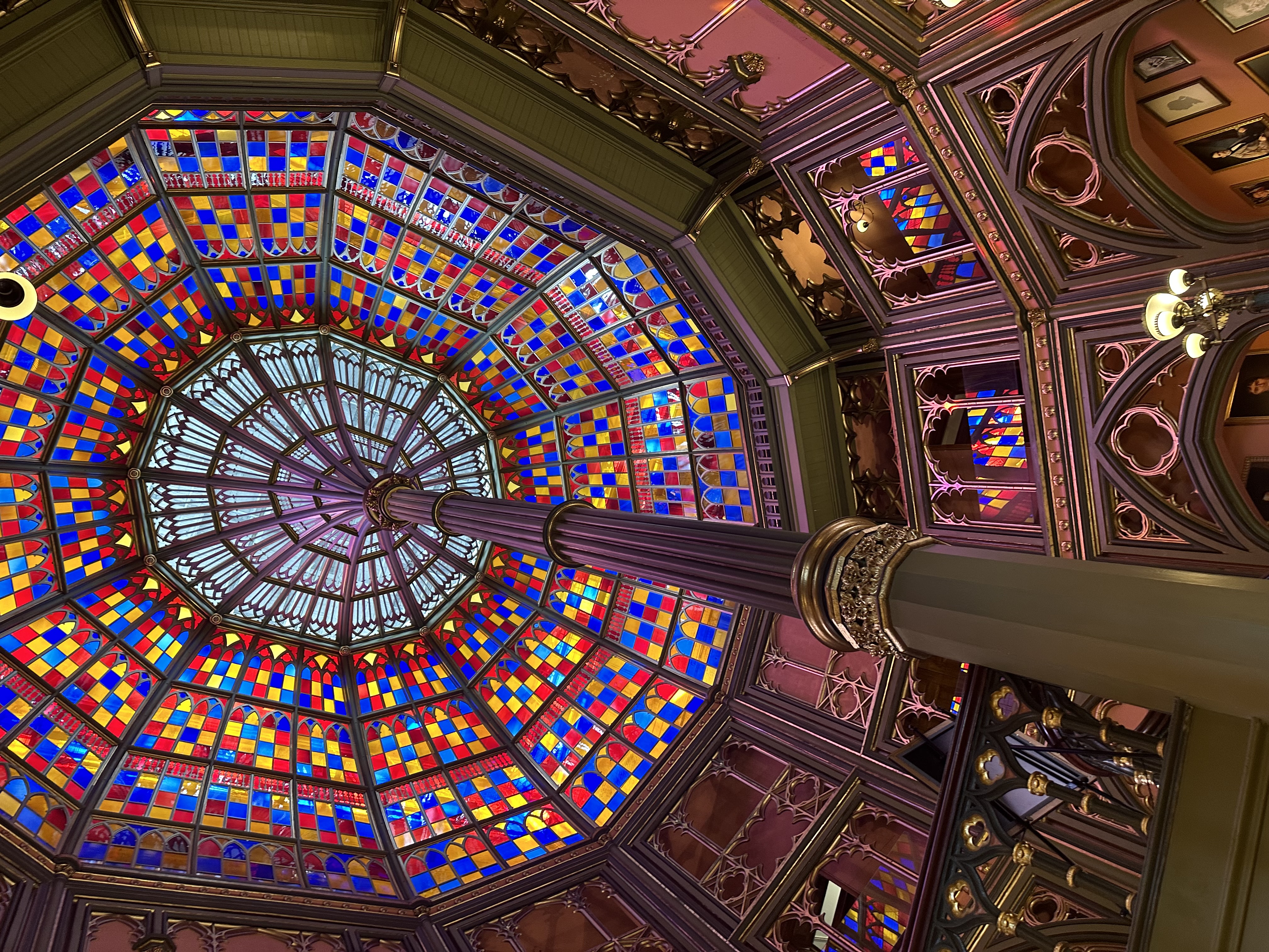 View of a mosaic ceiling in a building.