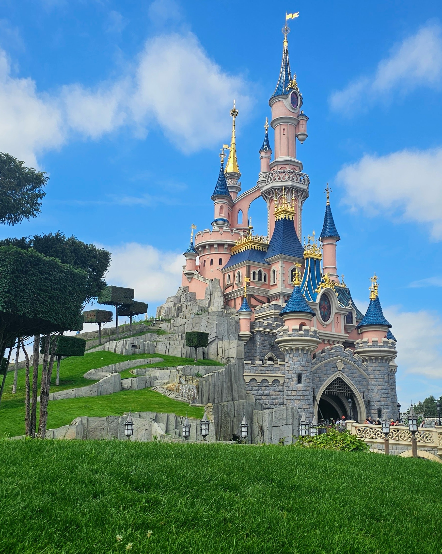 A Disney castle during the day.