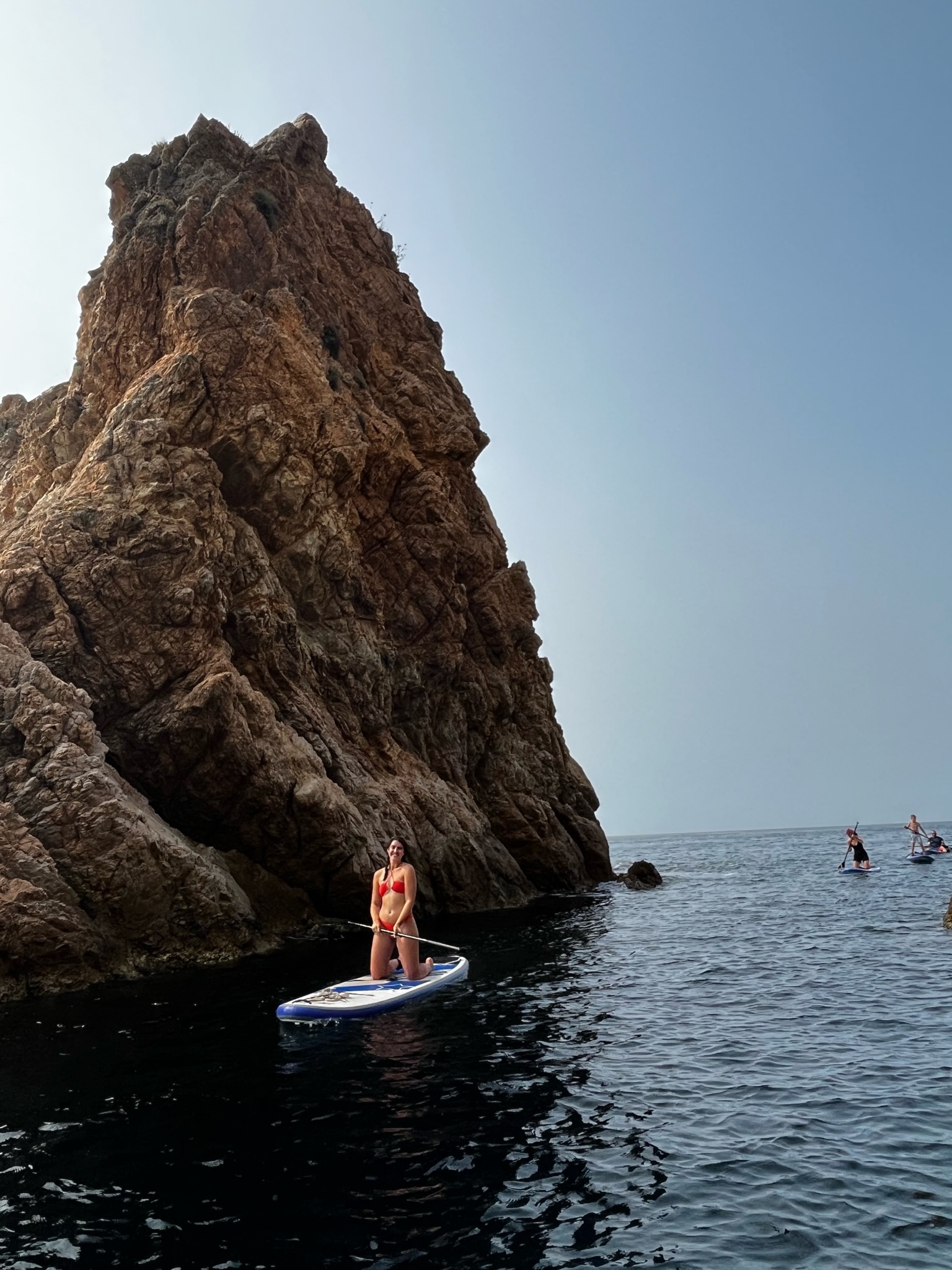 Paddle boarding on the sea.