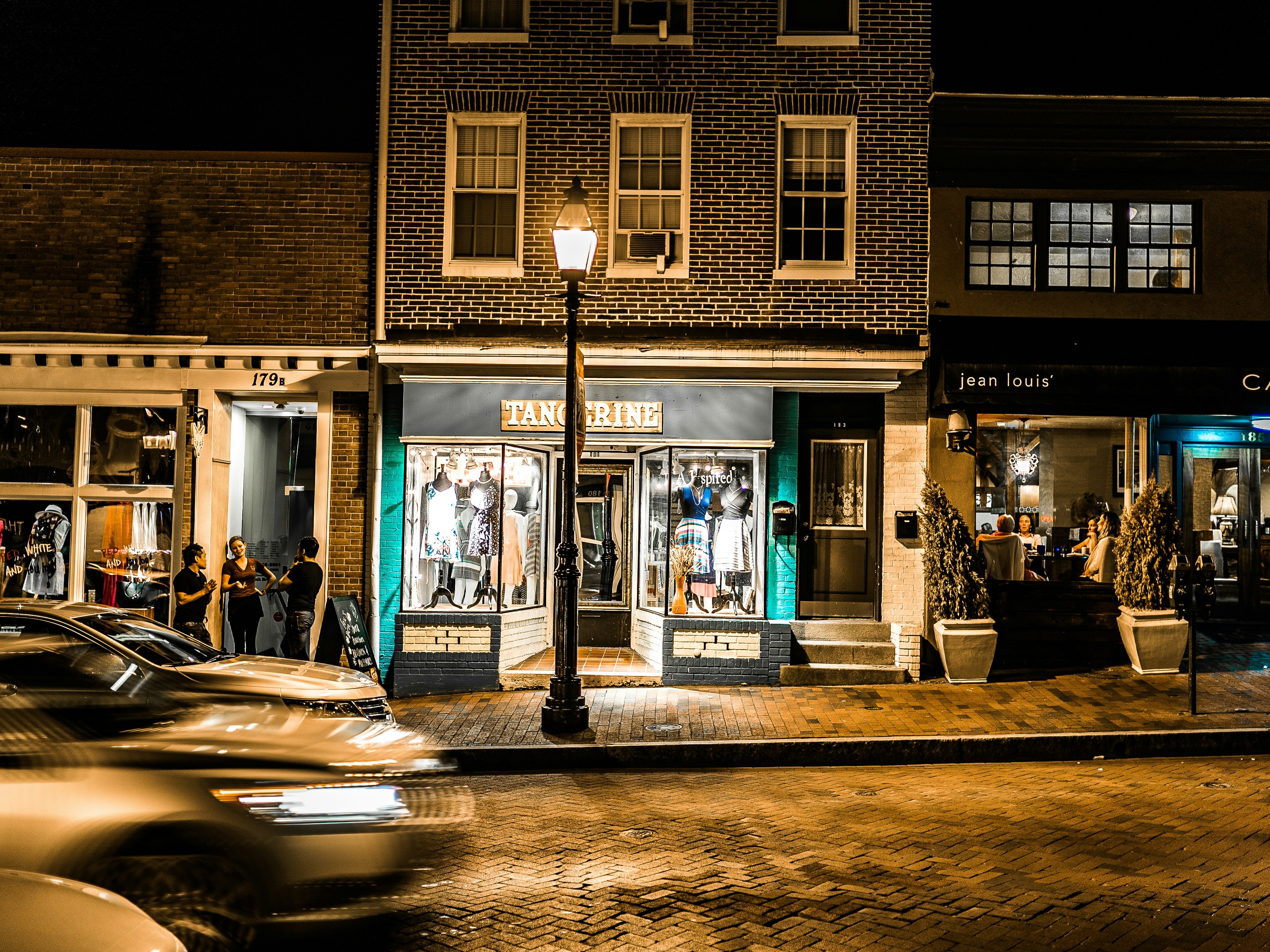 City street buildings and store fronts at nighttime
