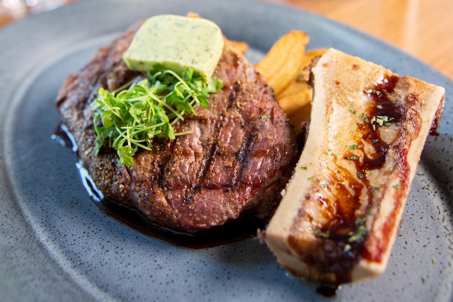 Taste this delicious rib-eye steak and bruléed bone-marrow at Lantana.