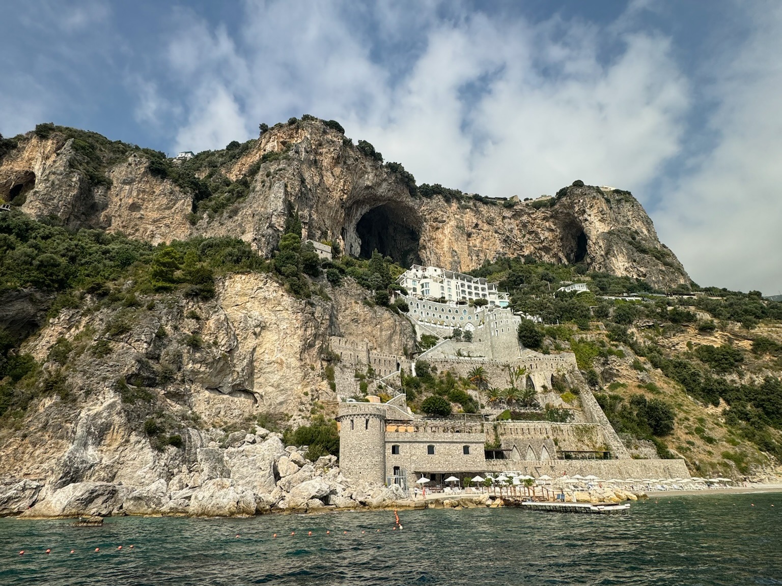 Old villas on cliff next to the water