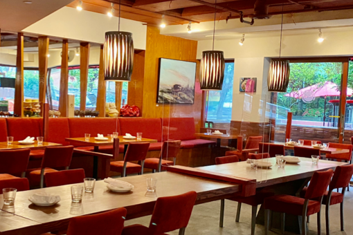 Tavola serves fresh house-made pastas and mains in this warm-style dining area.