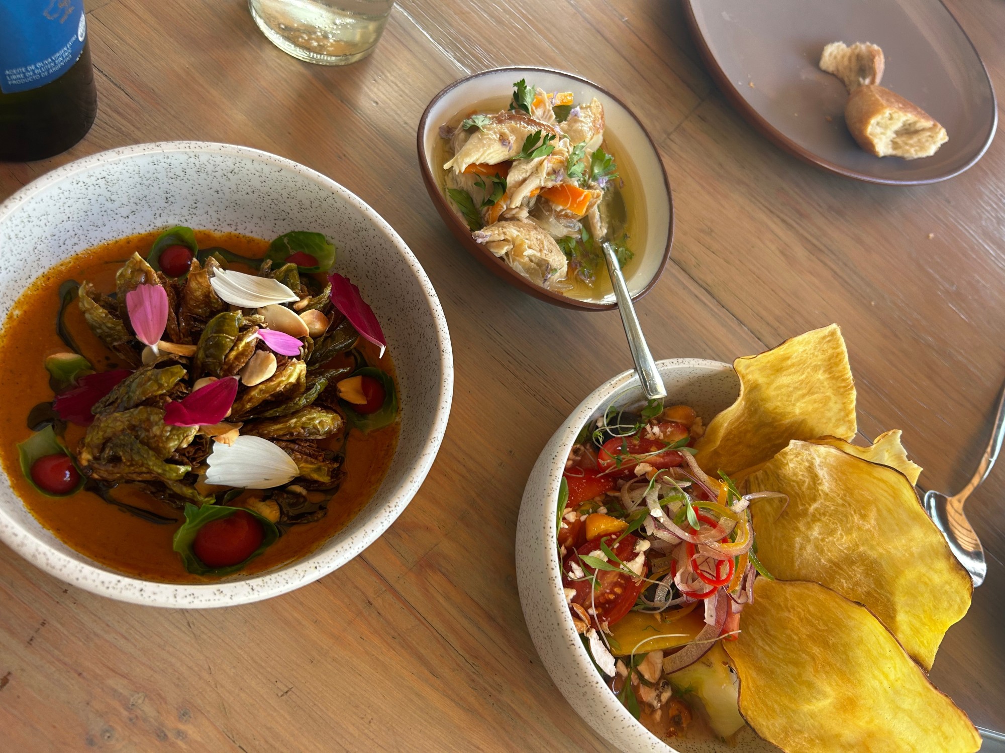 Three food items on a dining table.
