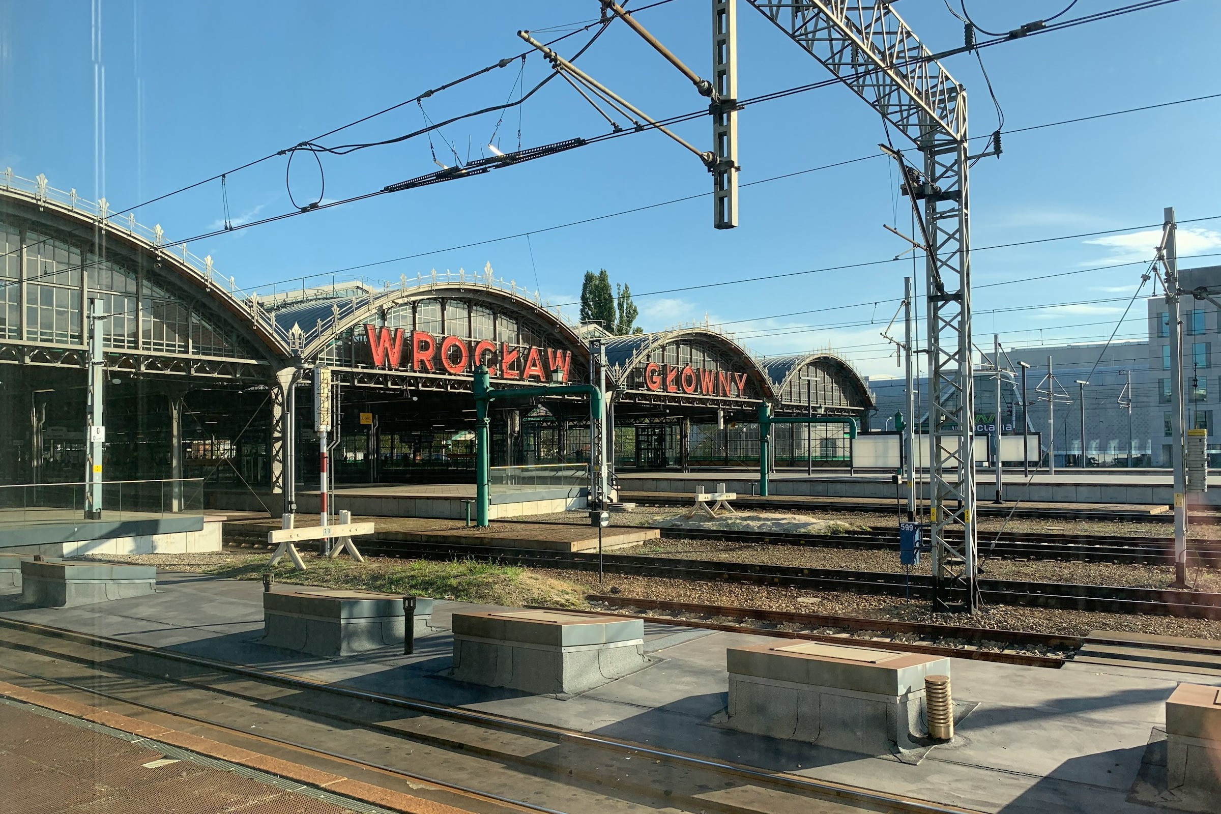 Outside the Wroclaw main train station on a sunny day.
