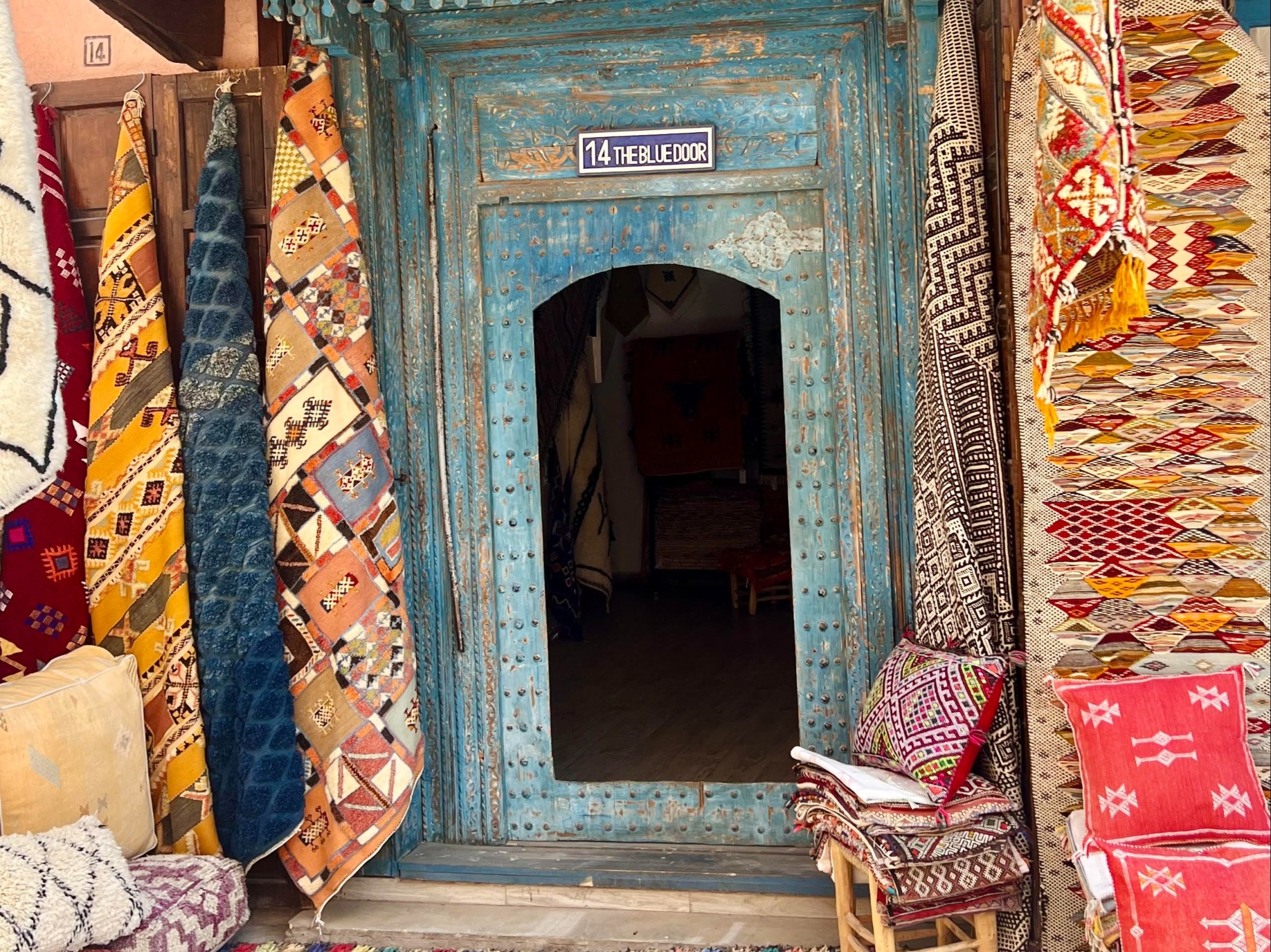 Carpet shop with blue door.