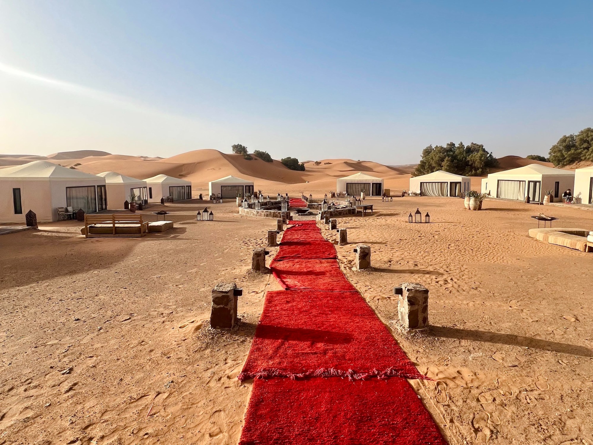 Luxury camps in the Sahara Desert on a scorching afternoon.
