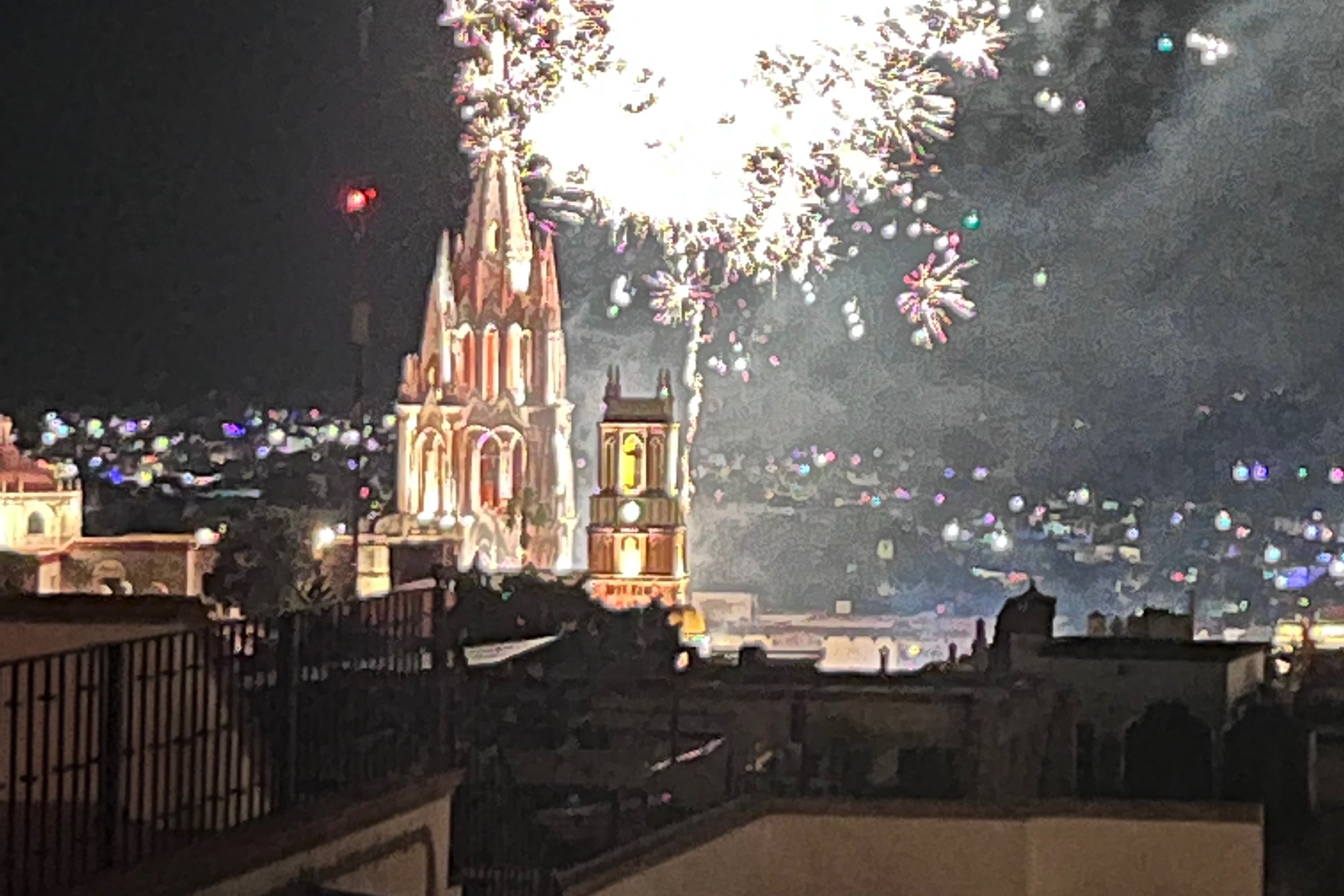Fireworks lighting up the sky viewed at Quince Rooftop restaurant.