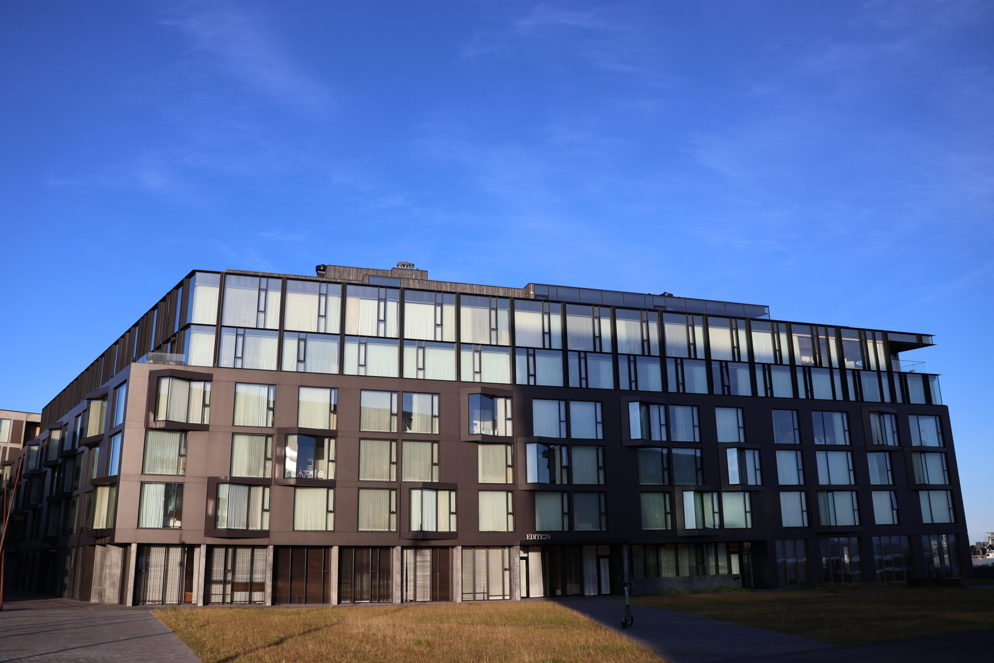 The exterior of a hotel building during the daytime
