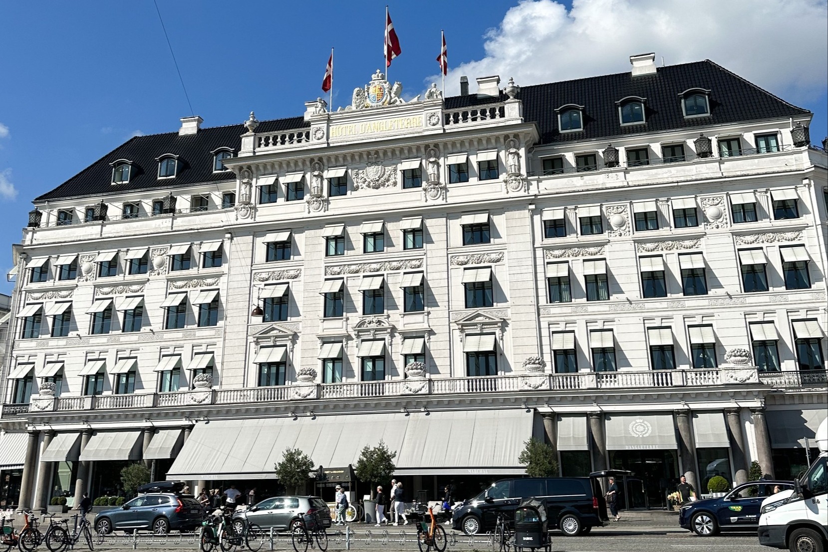 Hotel D'Angleterre glows under the sun.