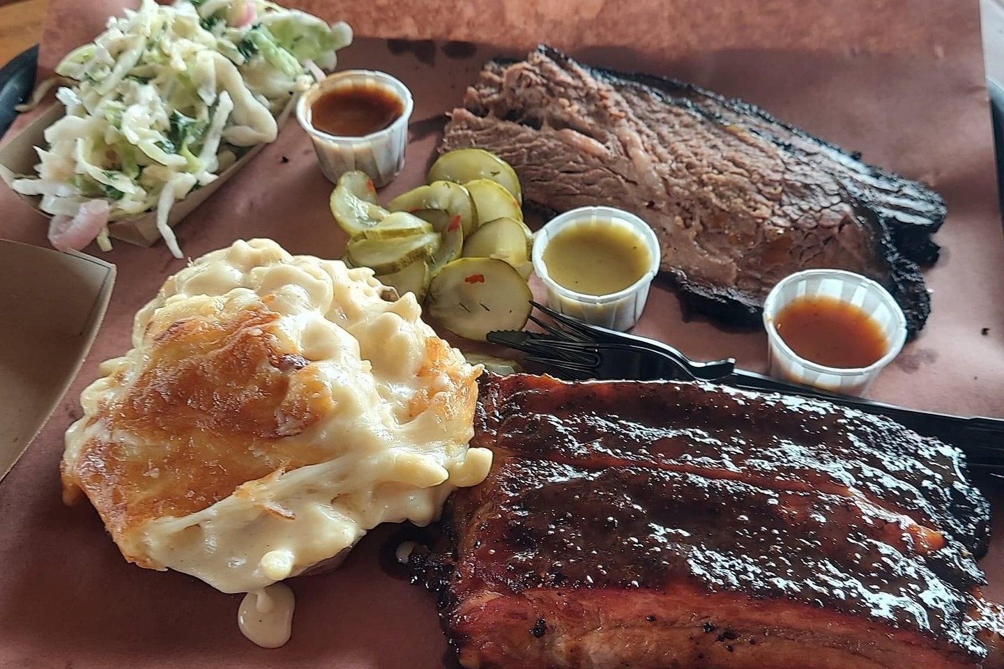 The barbecue with smoky flavor and tender meats at Lewis BBQ.