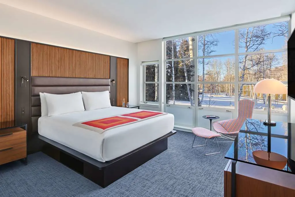 Stylish but simple room with plenty of space, interesting furniture and a great view of Aspen's natural scenery