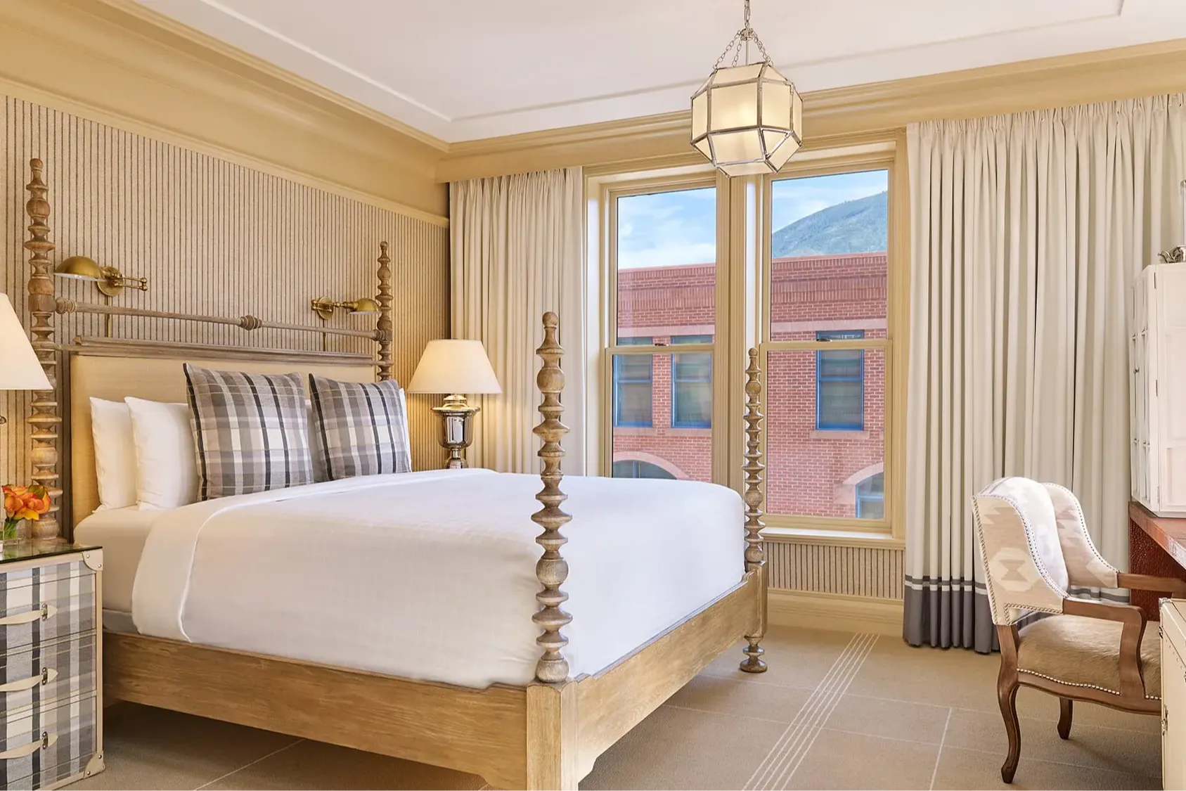 Exceptionally detailed room at Hotel Jerome, with elegant decor, hardwood furniture and chic fabrics